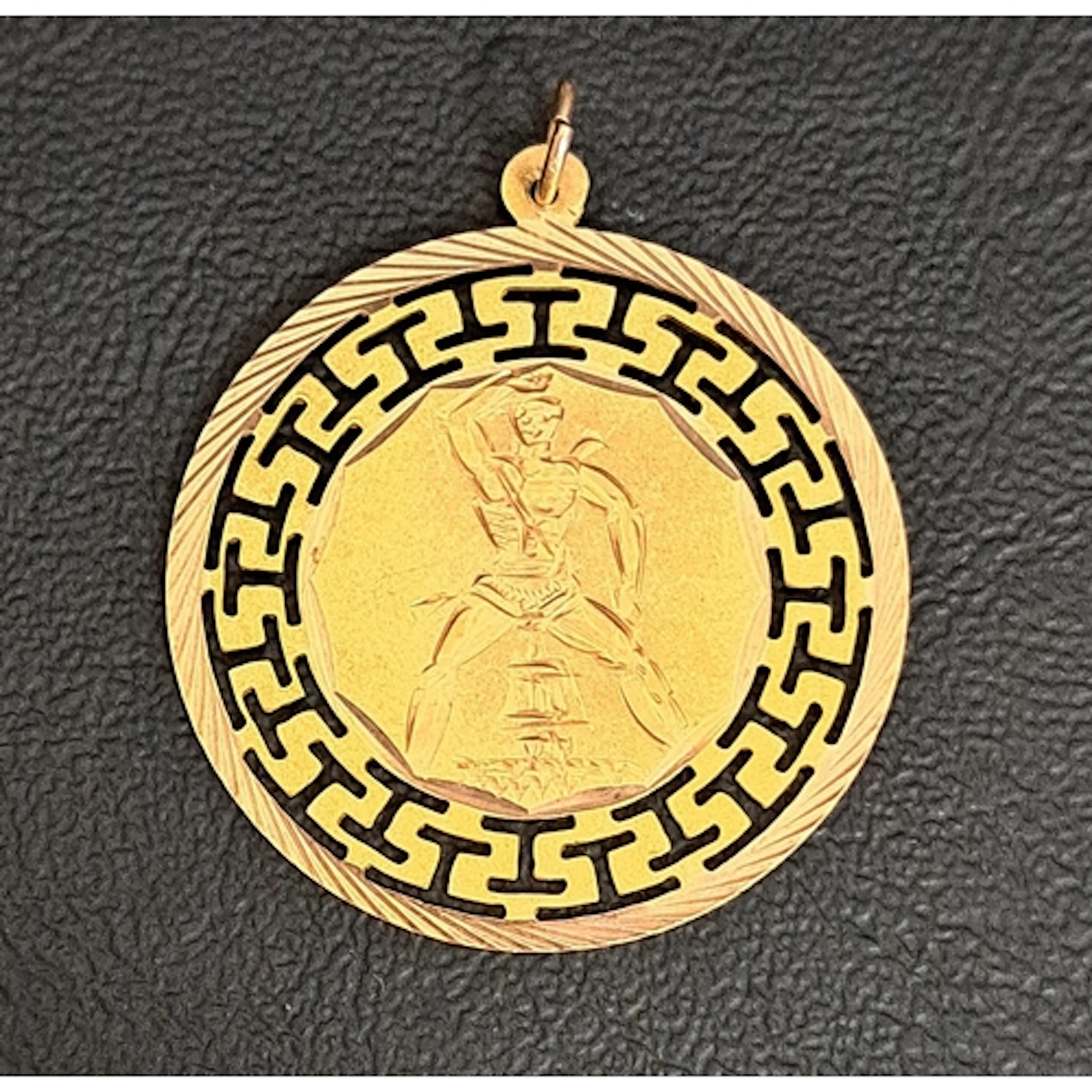 FOURTEEN CARAT GOLD PENDANT the circular pendant with The Pa...