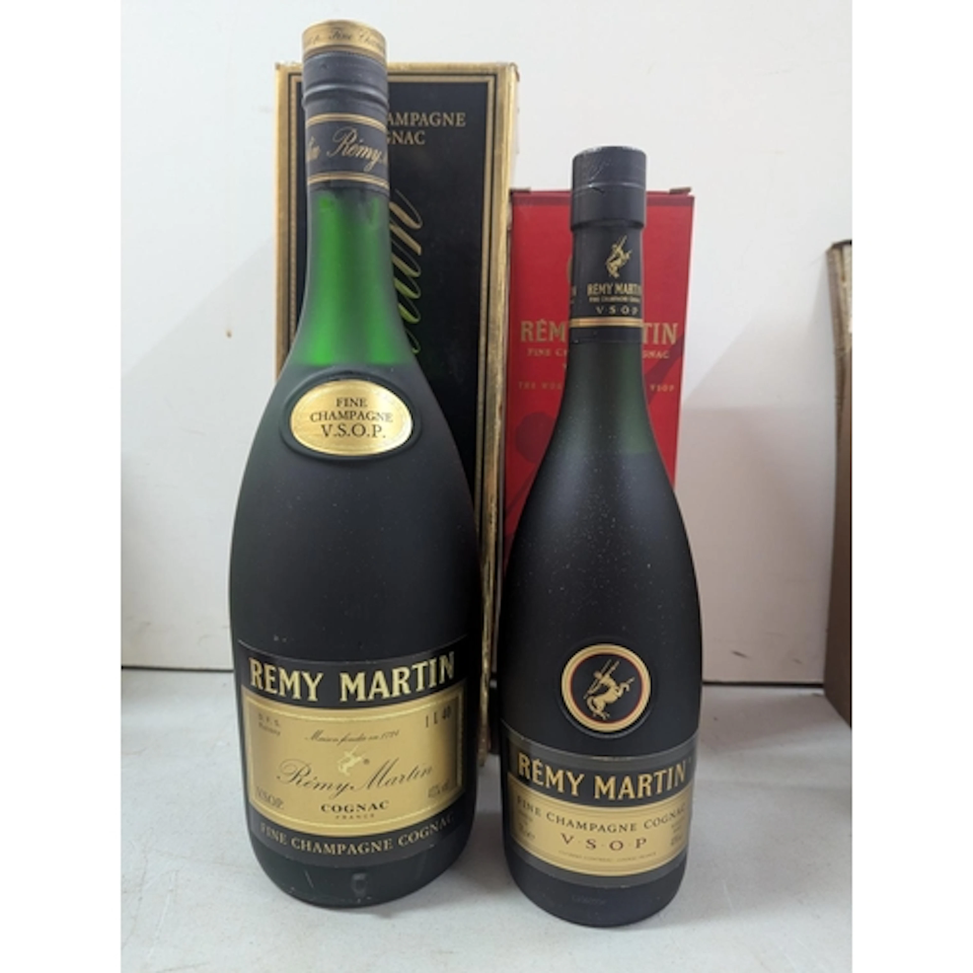 Two bottles of Rémy Martin Fine Champagne VSOP Cognac, in pr...