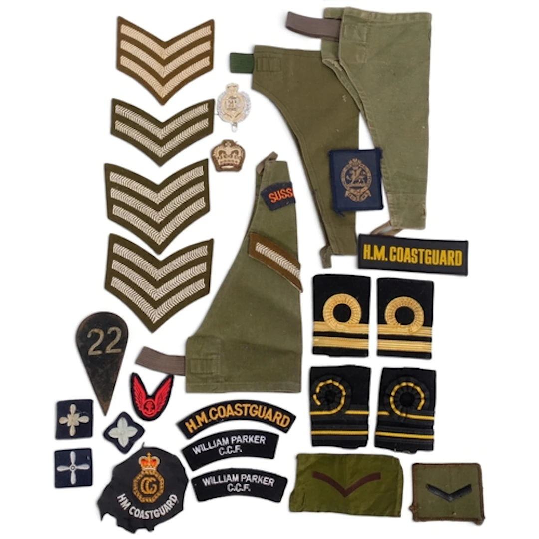 A collection of military rank epaulettes, a British Army Cad...