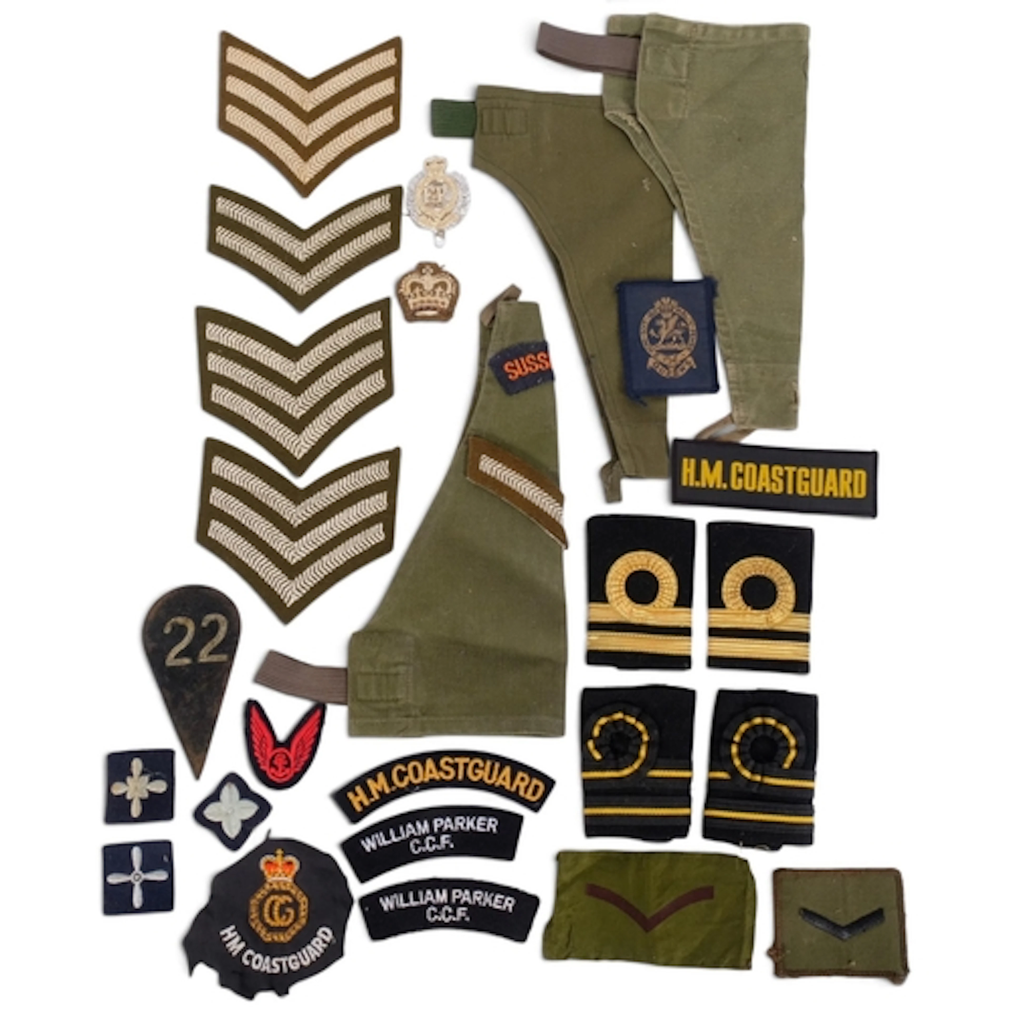 A collection of military rank epaulettes, a British Army Cad...