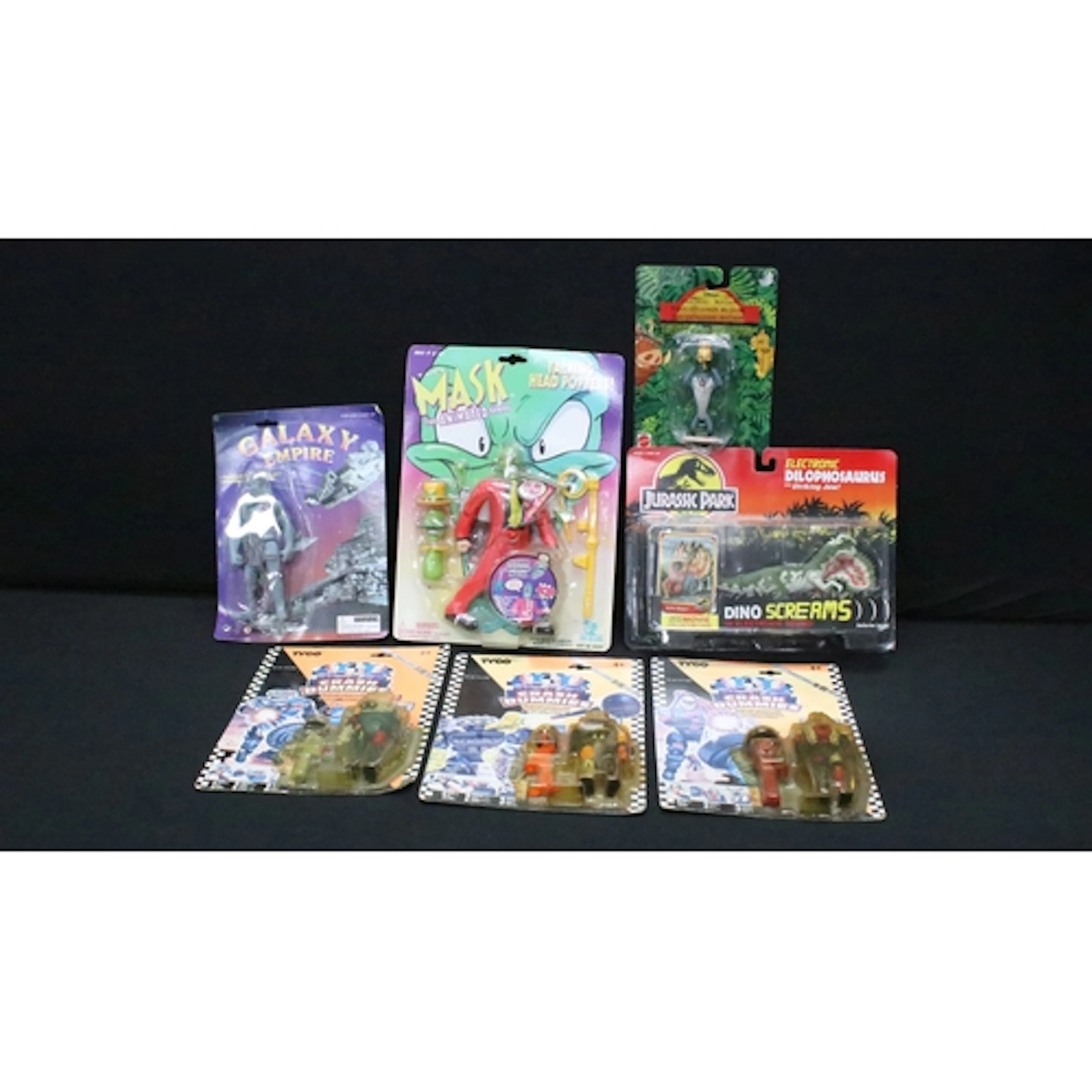 Seven carded TV & Film related figures to include Kenner Jur...