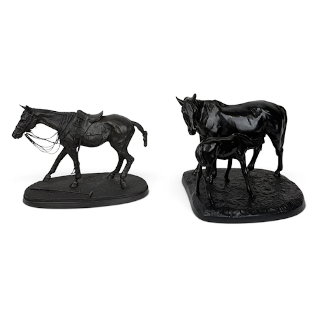 A RUSSIAN CAST IRON GROUP OF A MARE AND A SUCKLING FOAL With...