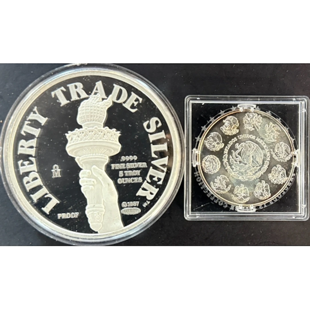 A pair of Mexican fine silver issues, comprising a five-ounc...
