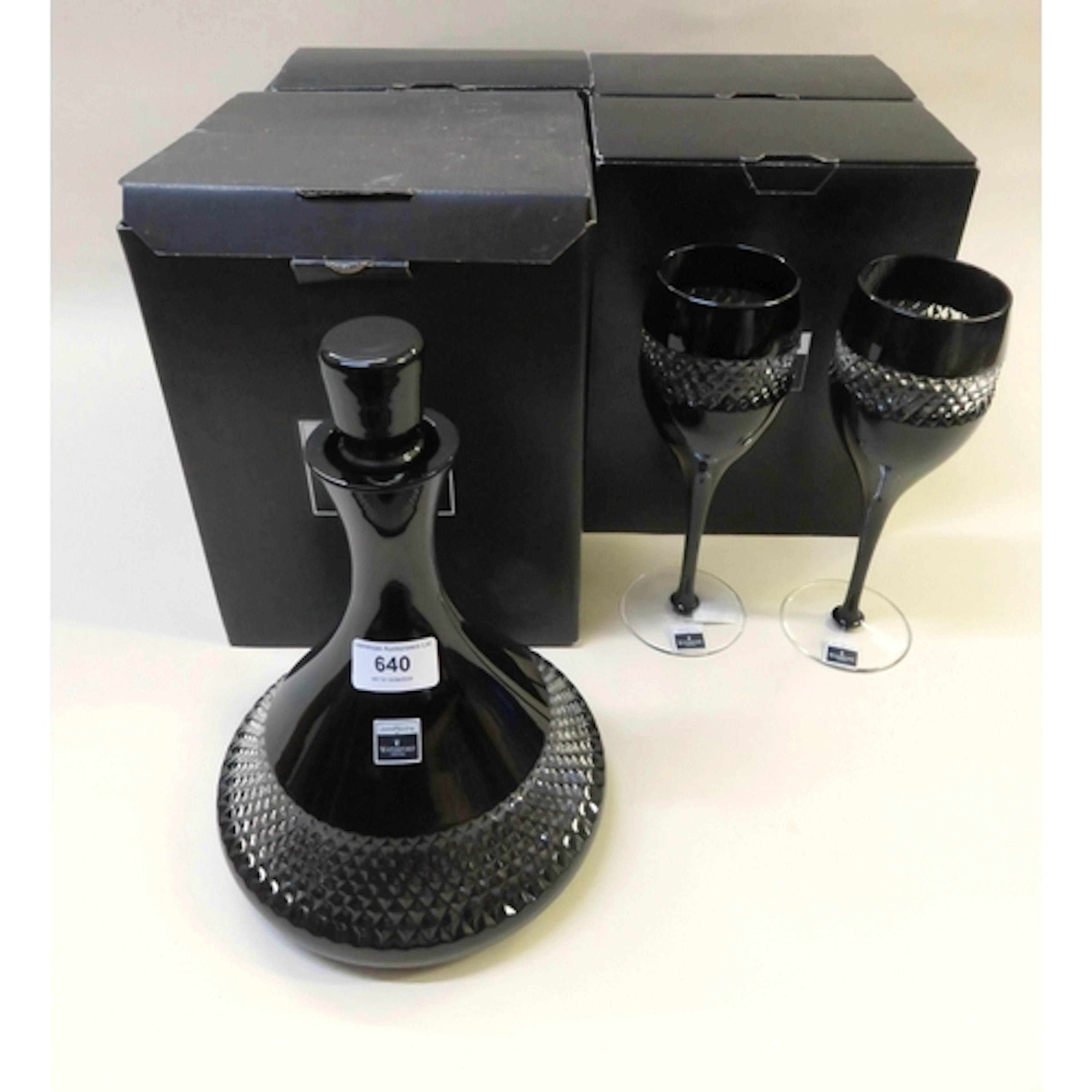 John Rocha for Waterford Crystal, six red wine glasses and a...