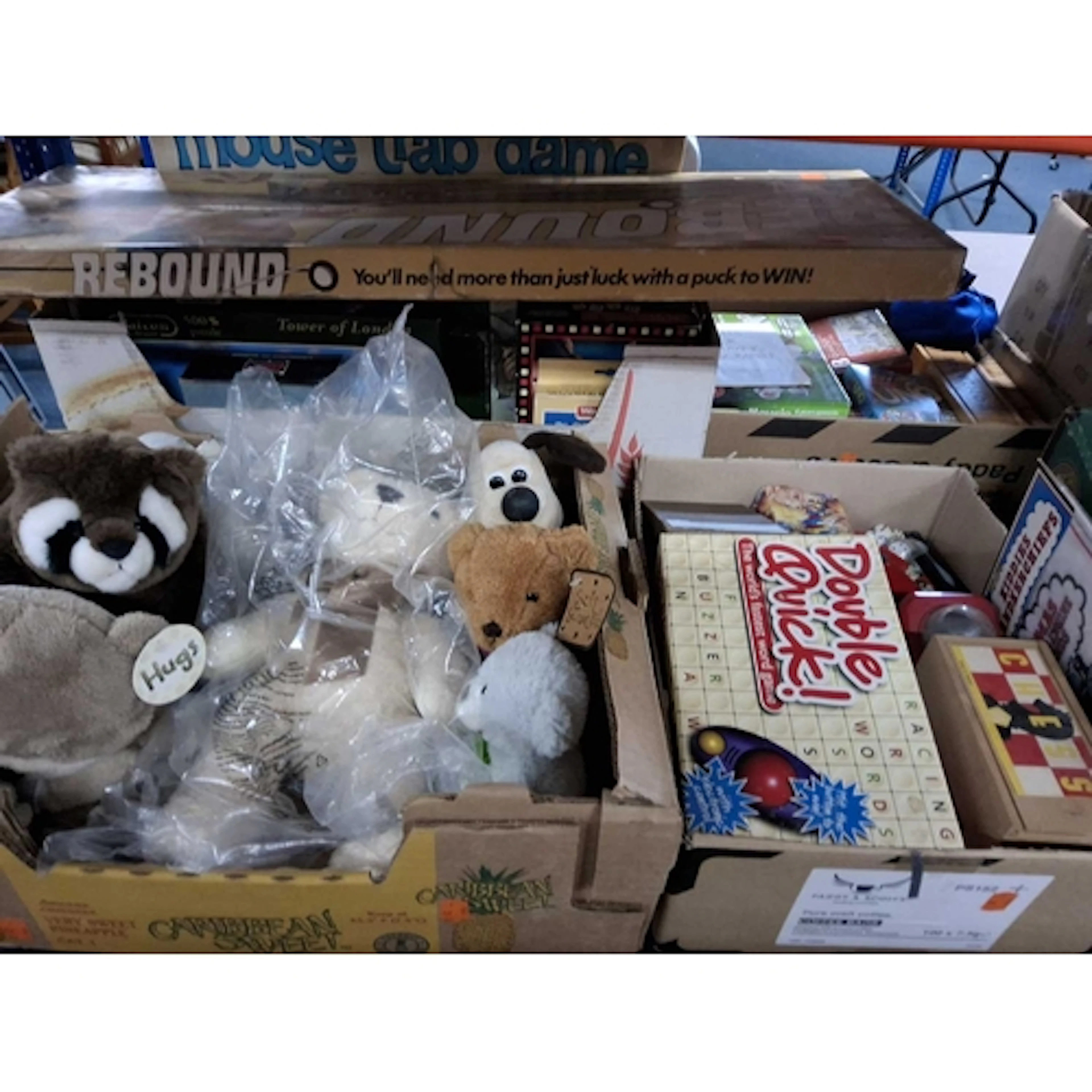 FOUR BOXES OF CHILDREN'S GAMES & SOFT TOYS, to include a Ste...
