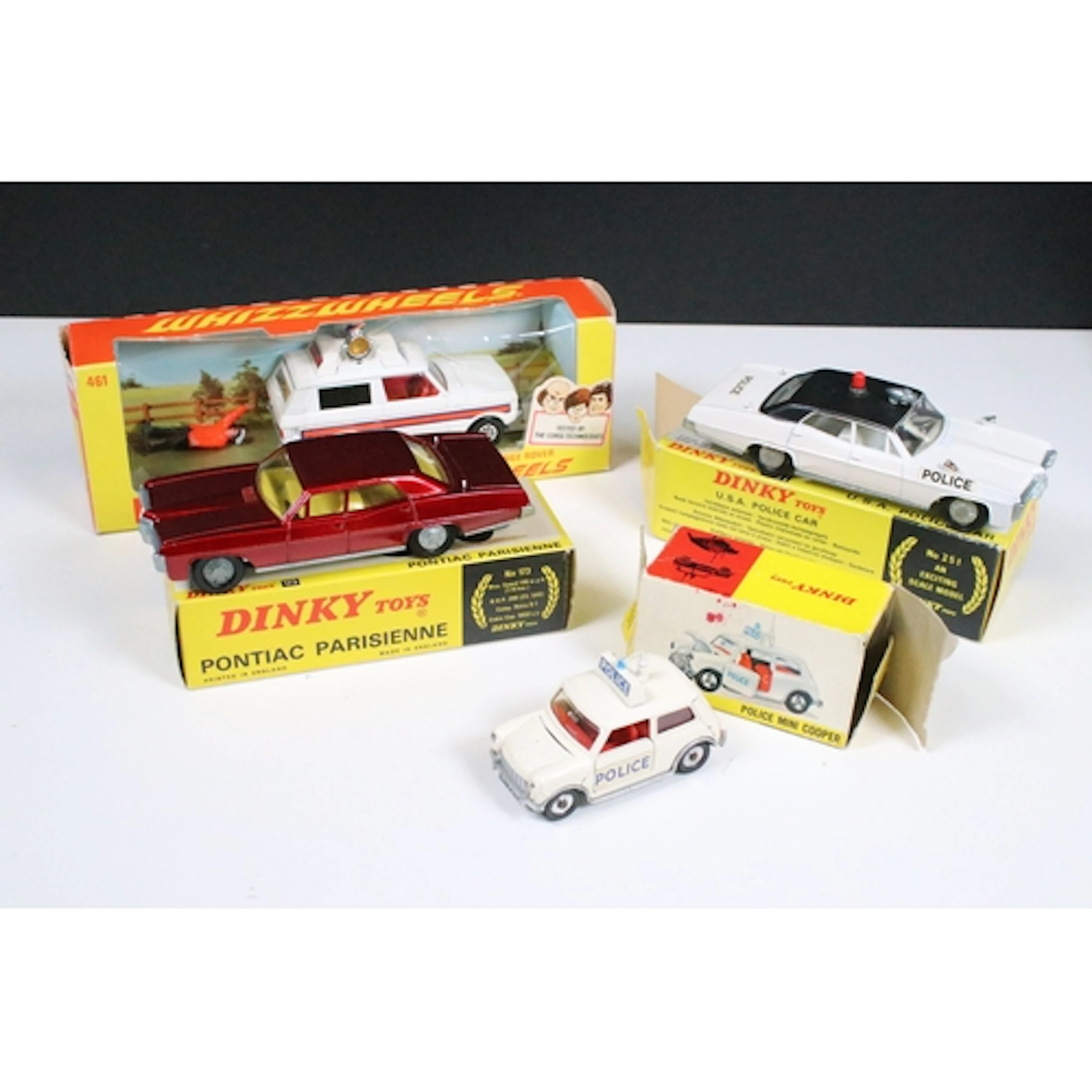 Four boxed Dinky diecast models to include 251 USA Police Ca...