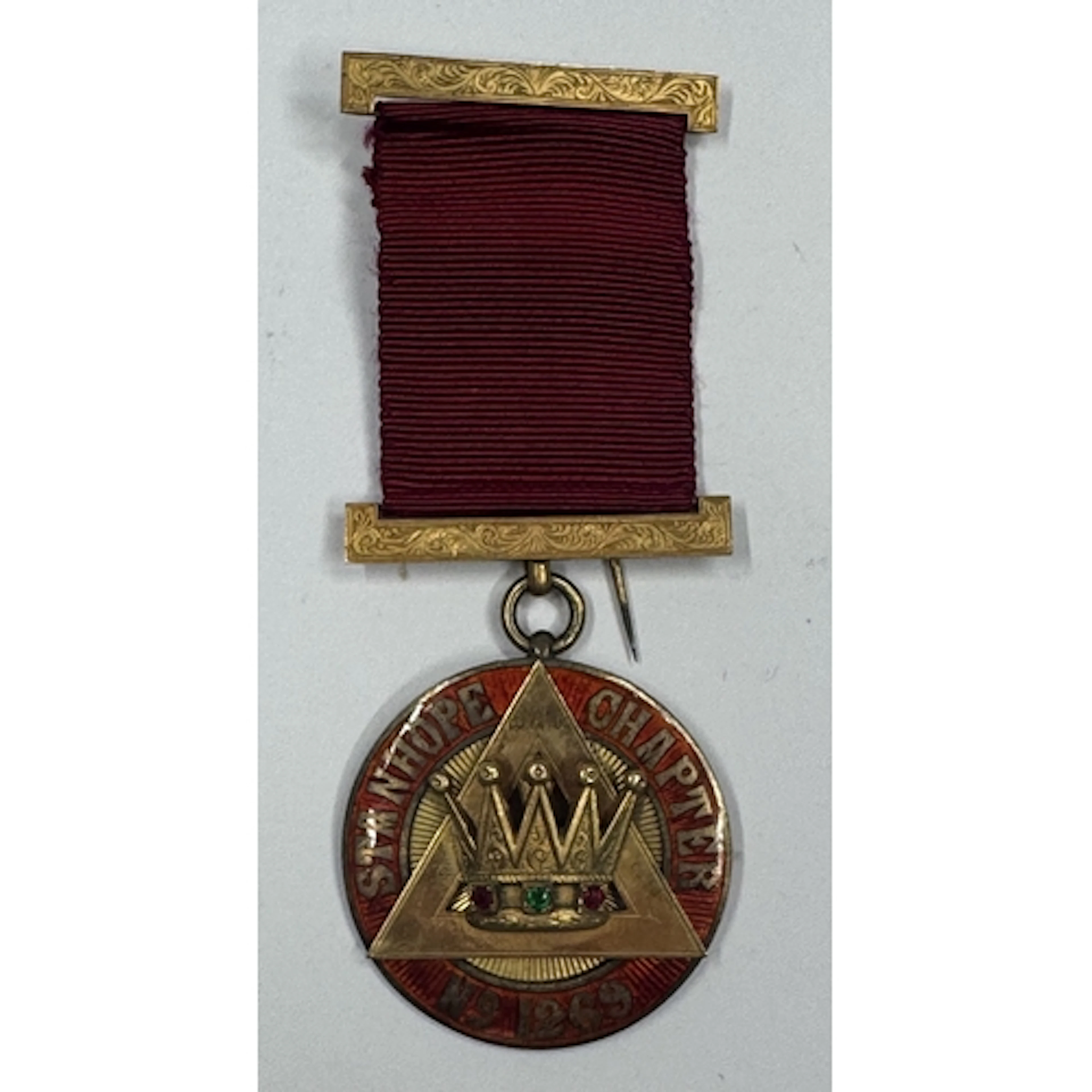 Masonic Memorabilia: a Masonic yellow metal and enamel medal...