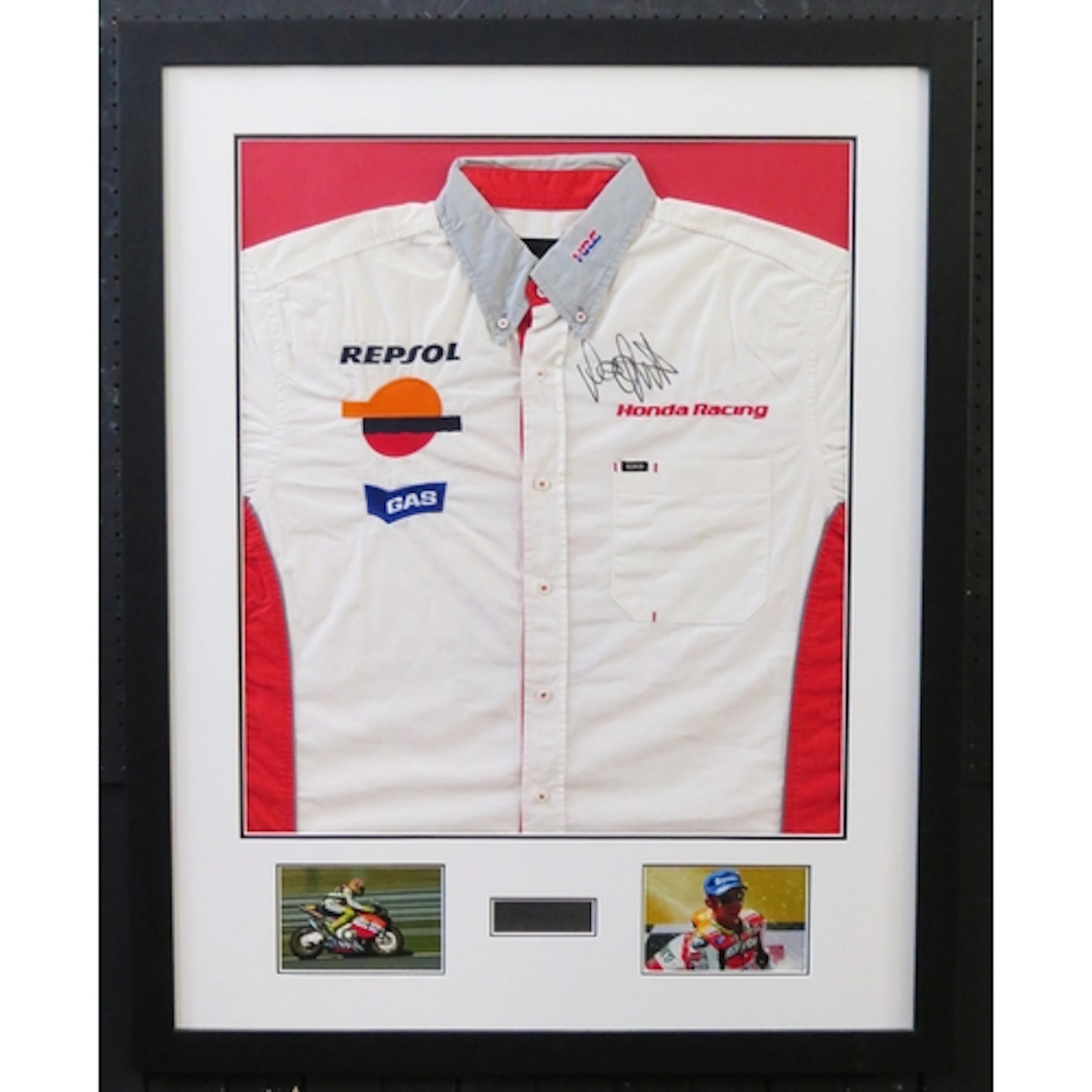 Valentino Rossi; signed Honda Racing team shirt, with two ph...