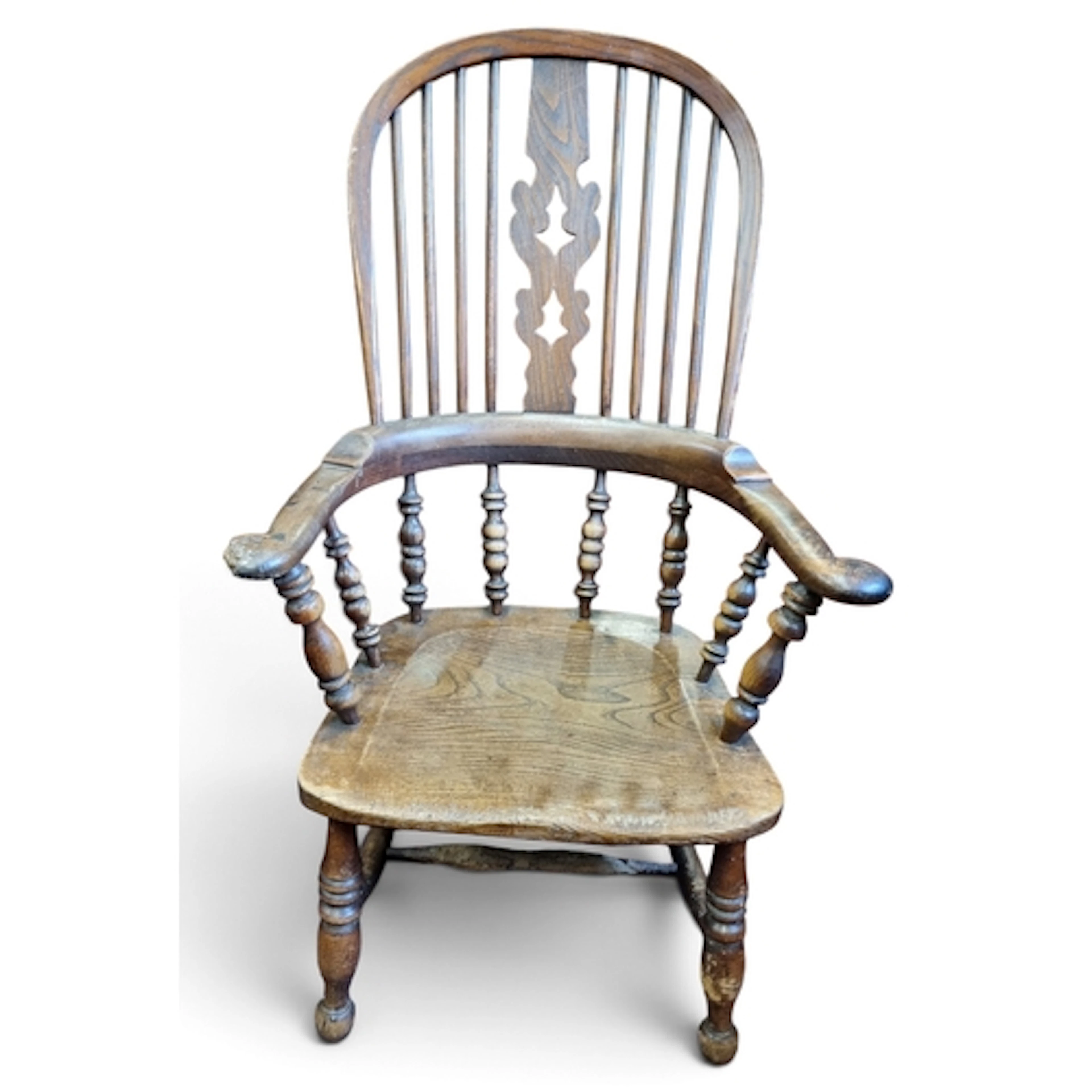 A 19th Century possibly earlier Elm Windsor Armchair with sl...