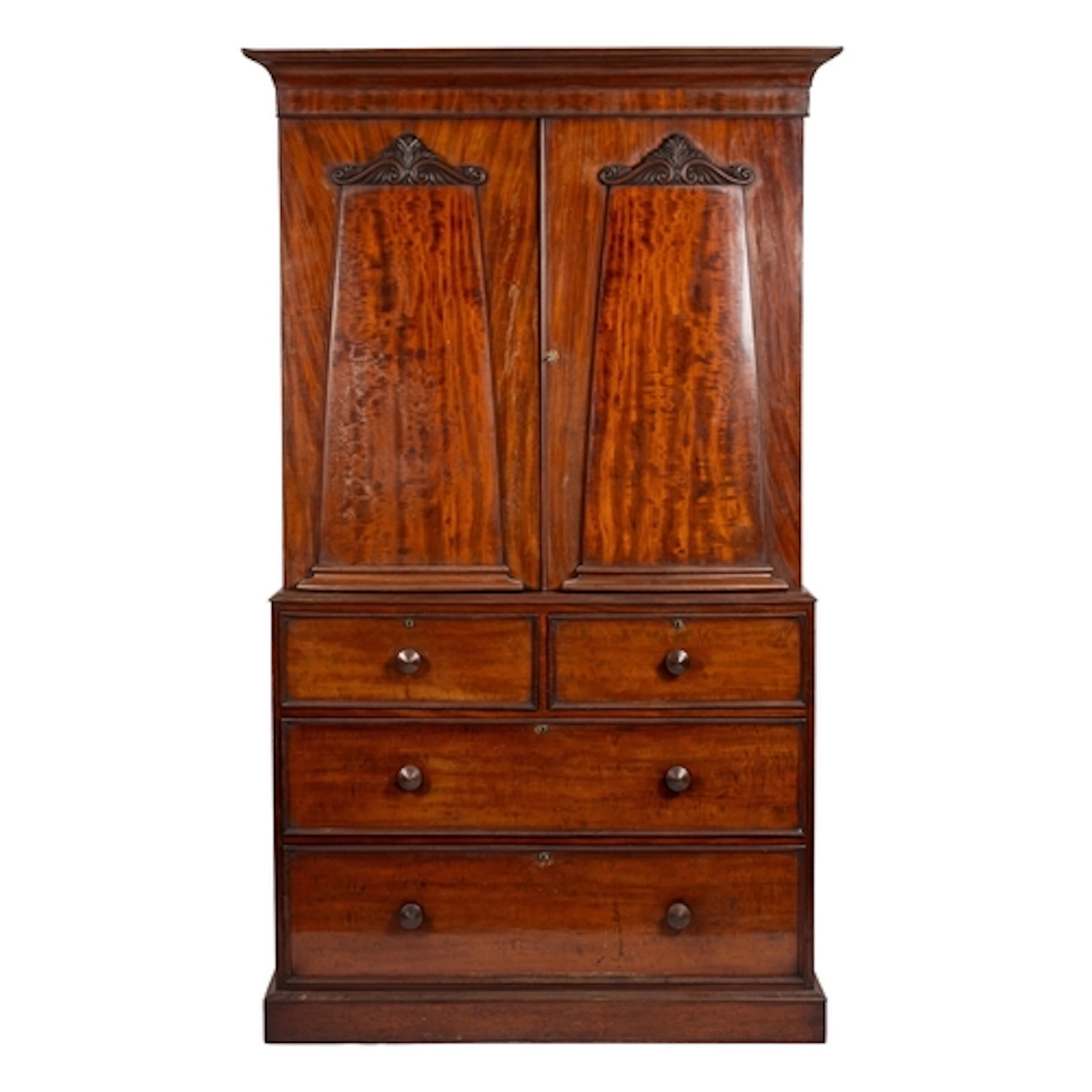 A Regency mahogany linen press, early 19th century; with ovo...