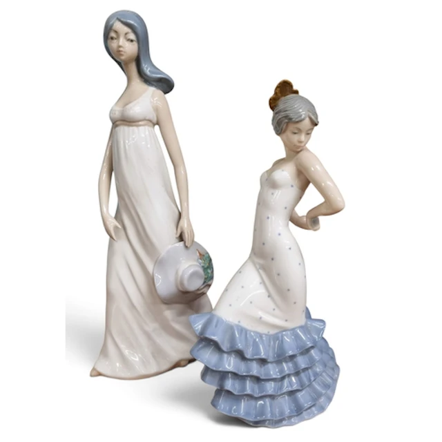 Two Nao Figures, one of a Woman along with a Casades Figure....
