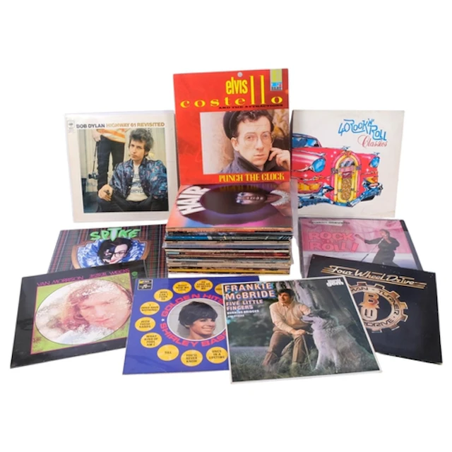 A collection of '70s/'80s vinyl albums, including a signed S...