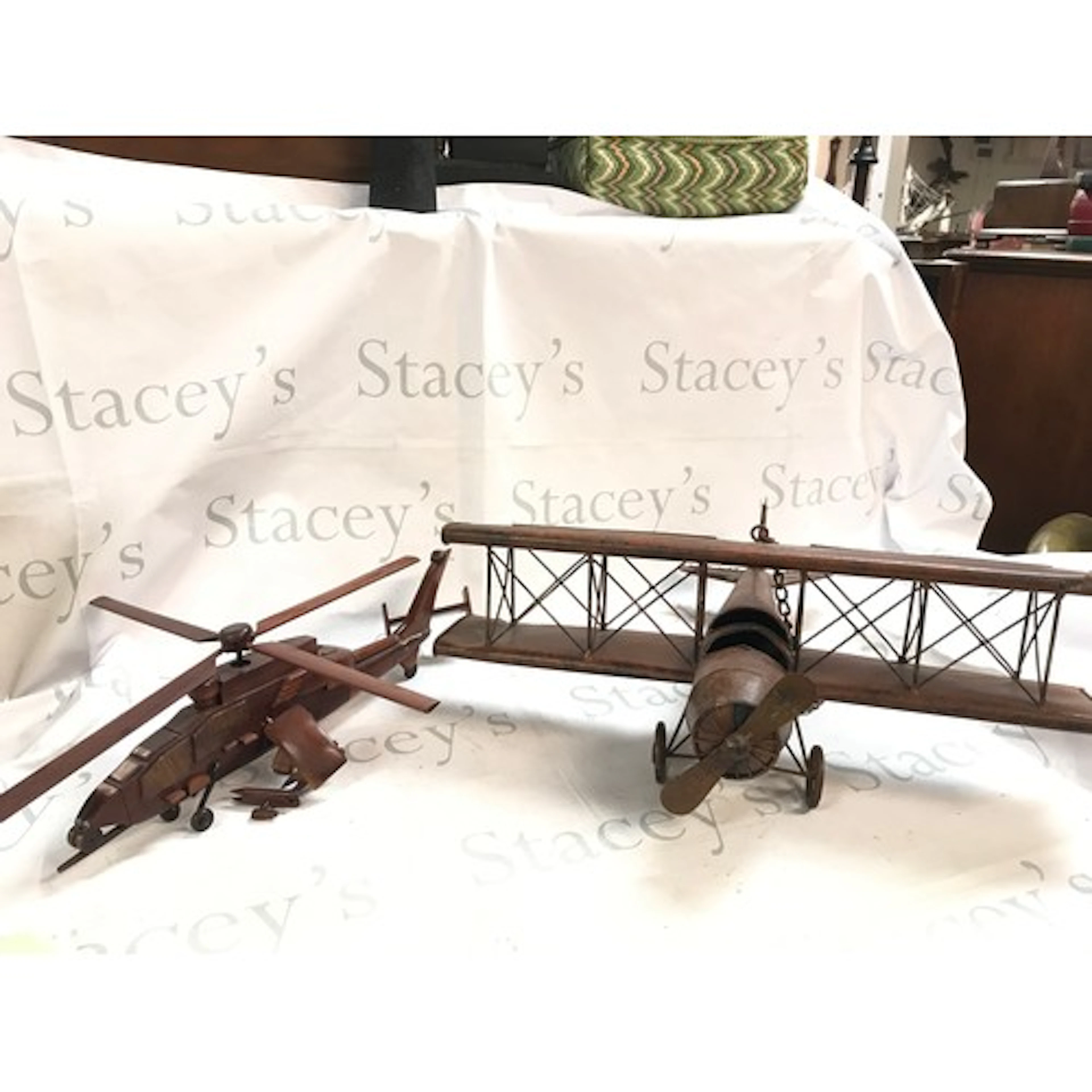 A model Helicopter wood sculpture and a plane (2)