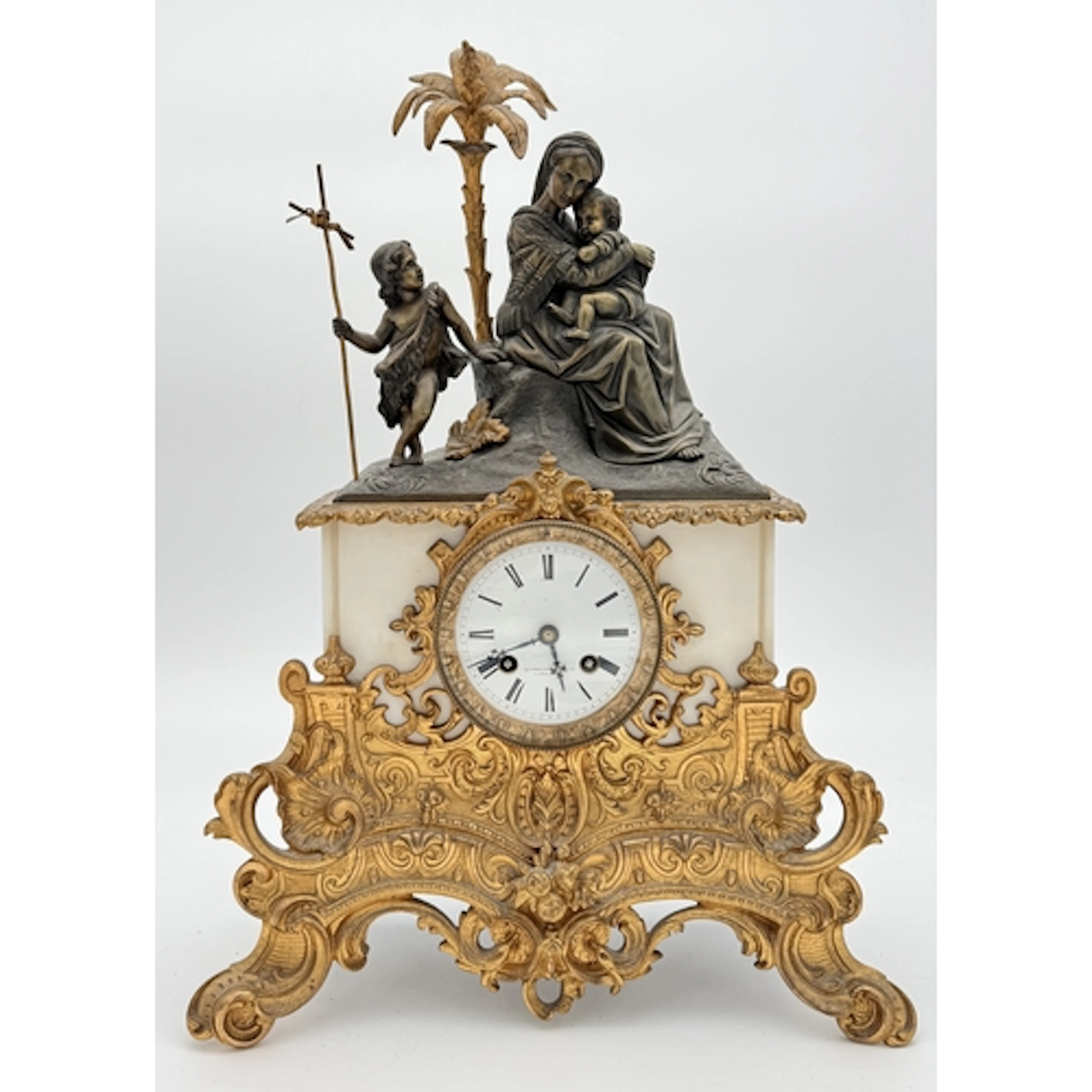 A 19TH CENTURY FRENCH BRONZE AND MARBLE MANTEL CLOCK SURMOUN...