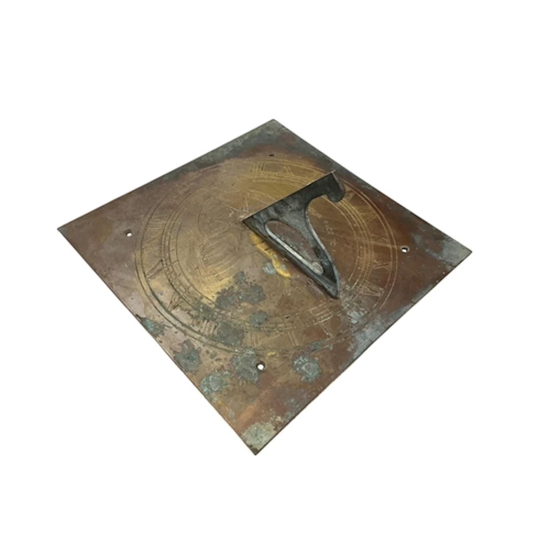 An engraved square brass sundial ' Turn Your Face To The Sun...