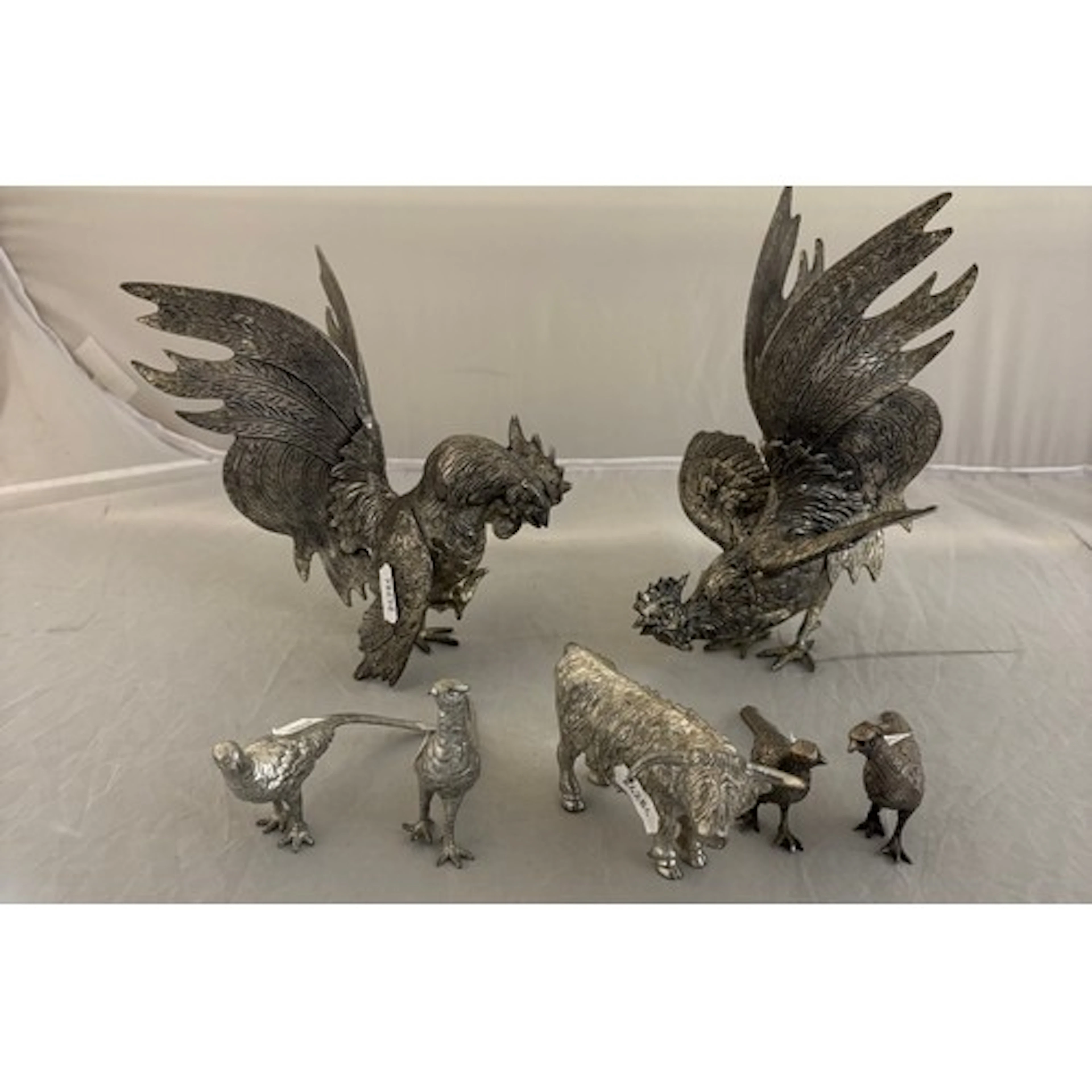 A qty of silver plated birds