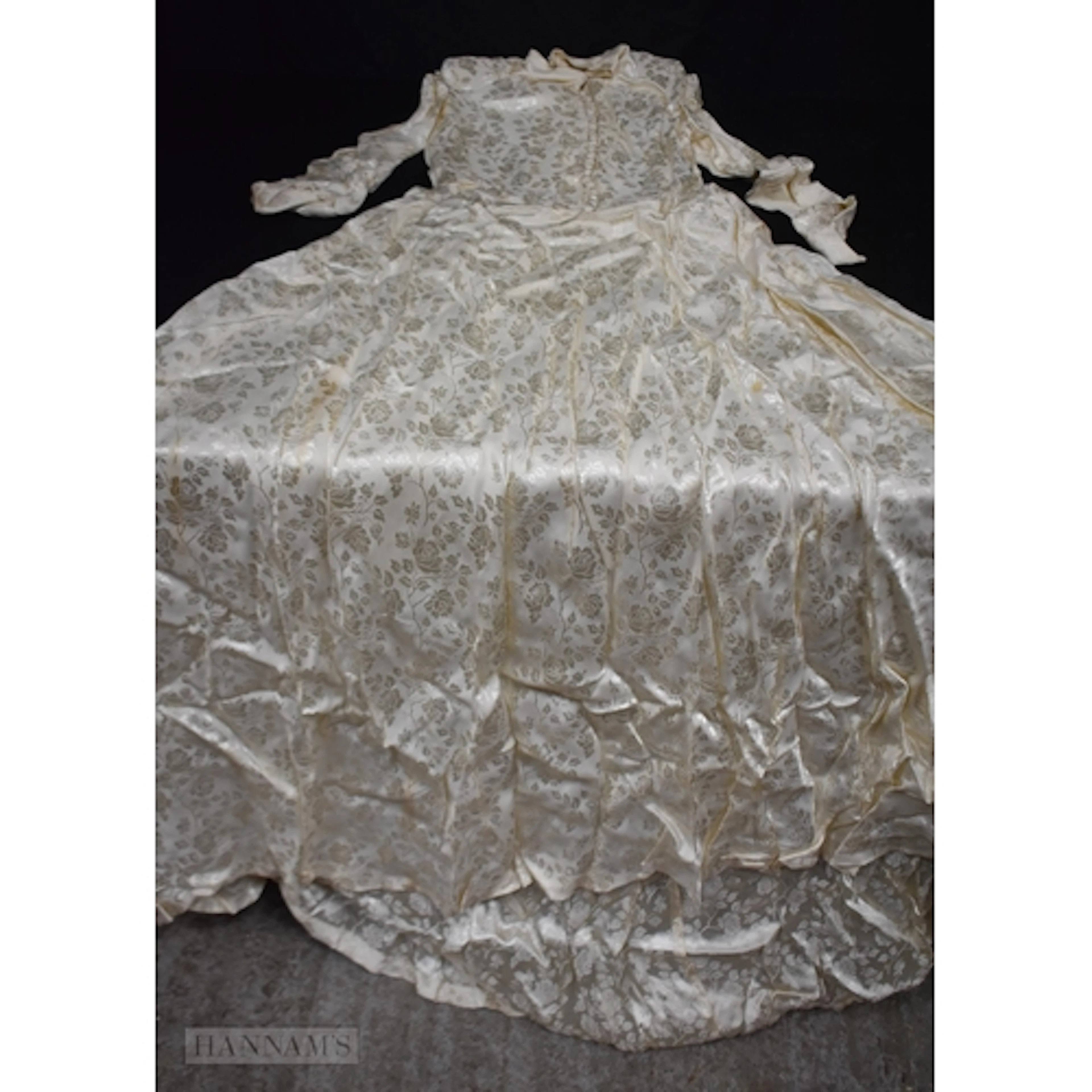 A vintage silk wedding dress retailed by Bovine and Hollings...