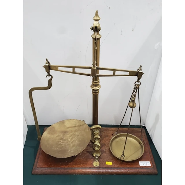 A set of Victorian brass Balance Scales with weights, on mah...