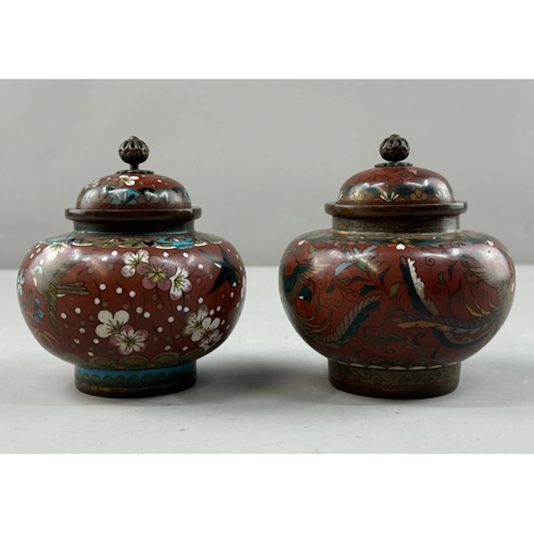 Oriental: a pair of late Meiji Japanese cloisonne lidded jar...