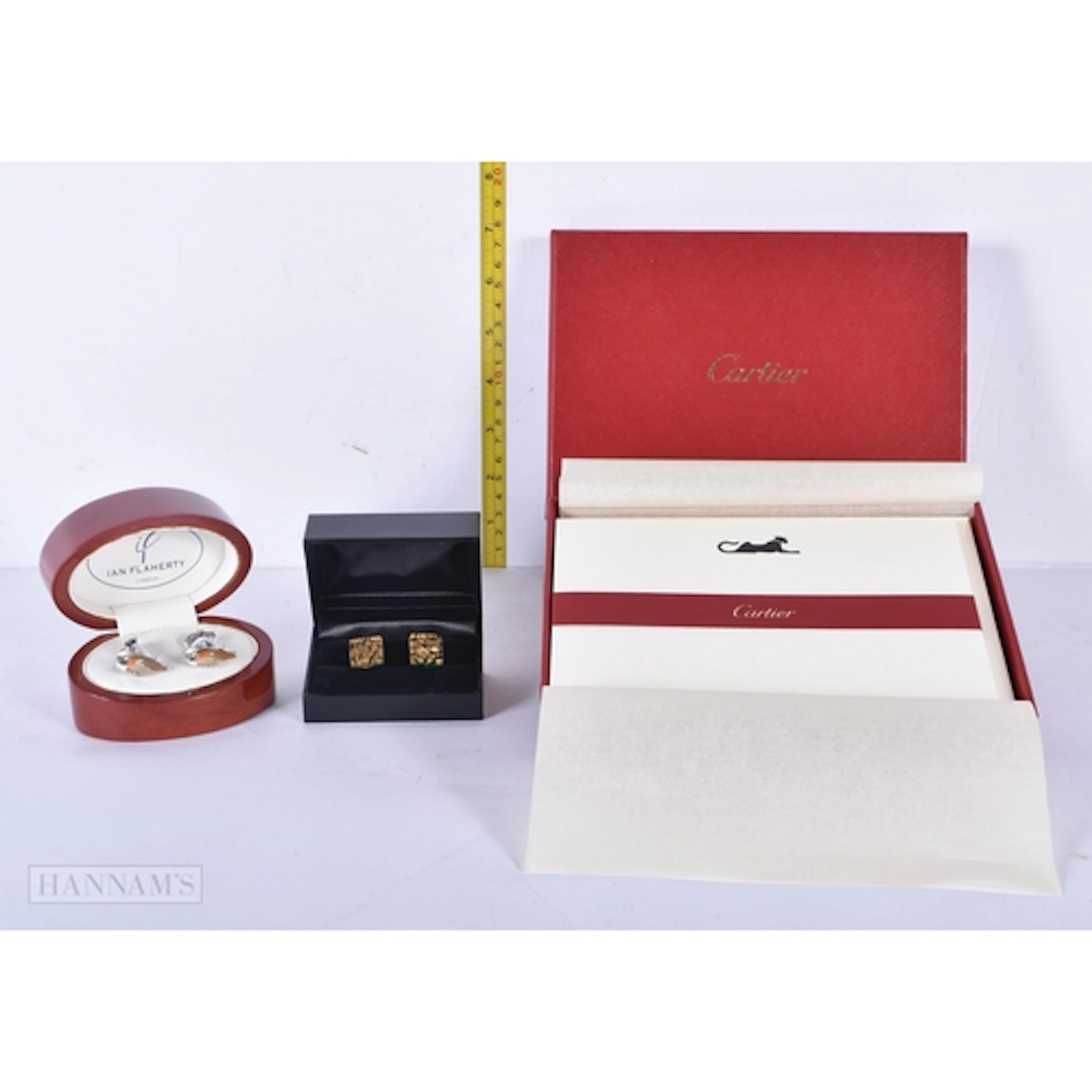 A cased set of Ian Flaherty of London Cufflinks together wit...