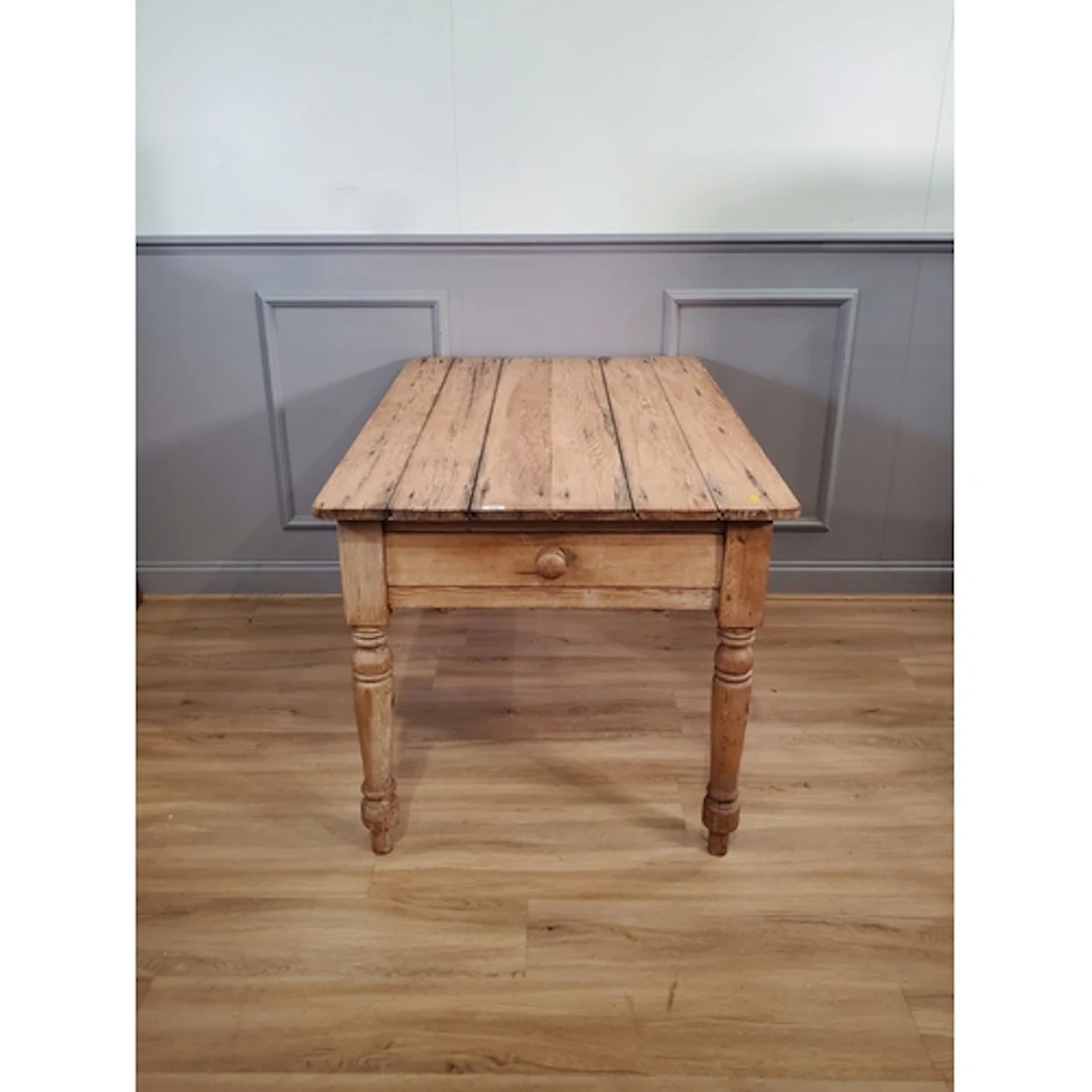 A pine Kitchen Table with five plank top, single fitted draw...