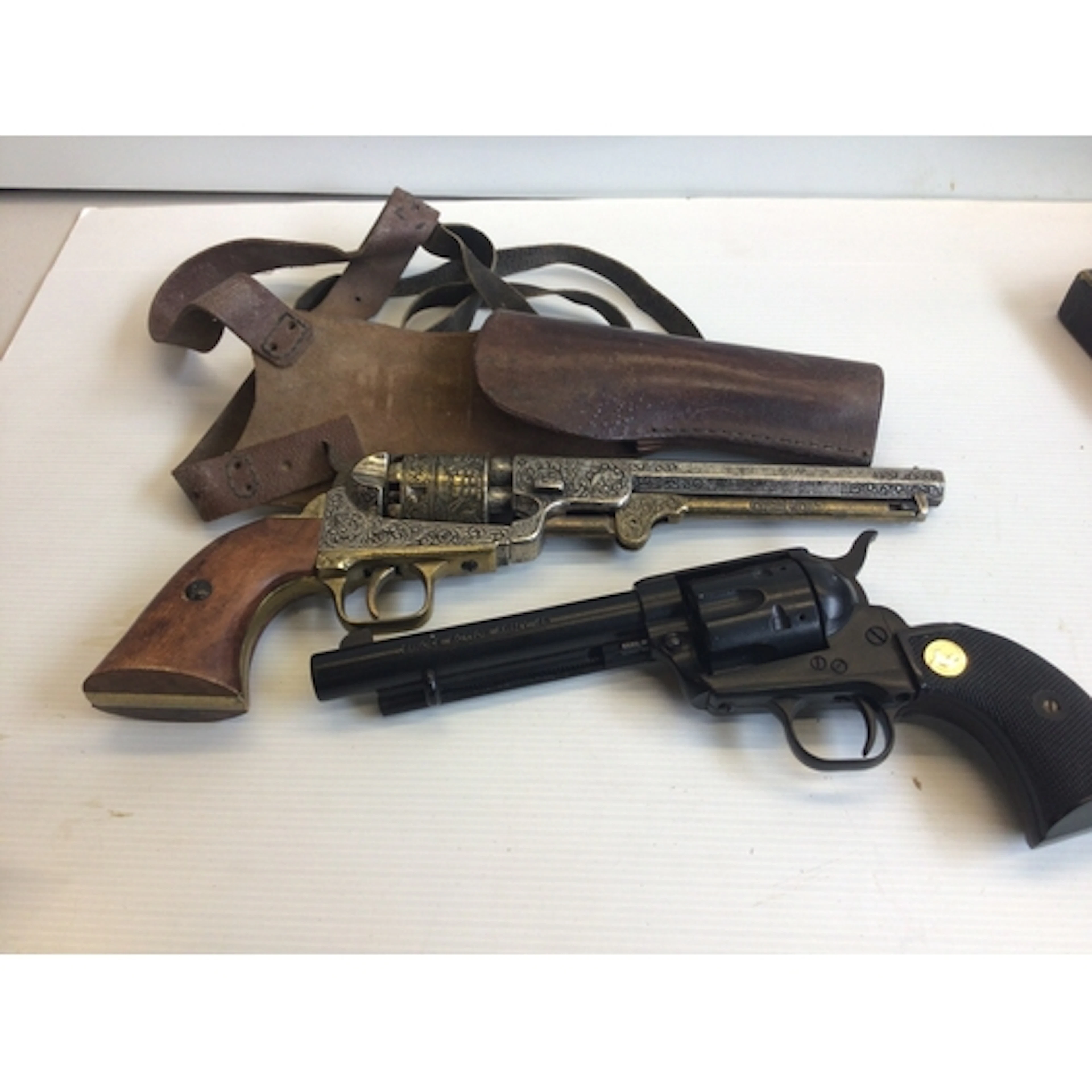 Two Replica Vintage revolvers non firing ornaments. With a l...
