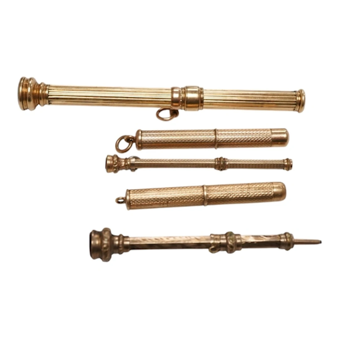 Two mid to late 20th century 9ct engine turned cased propell...