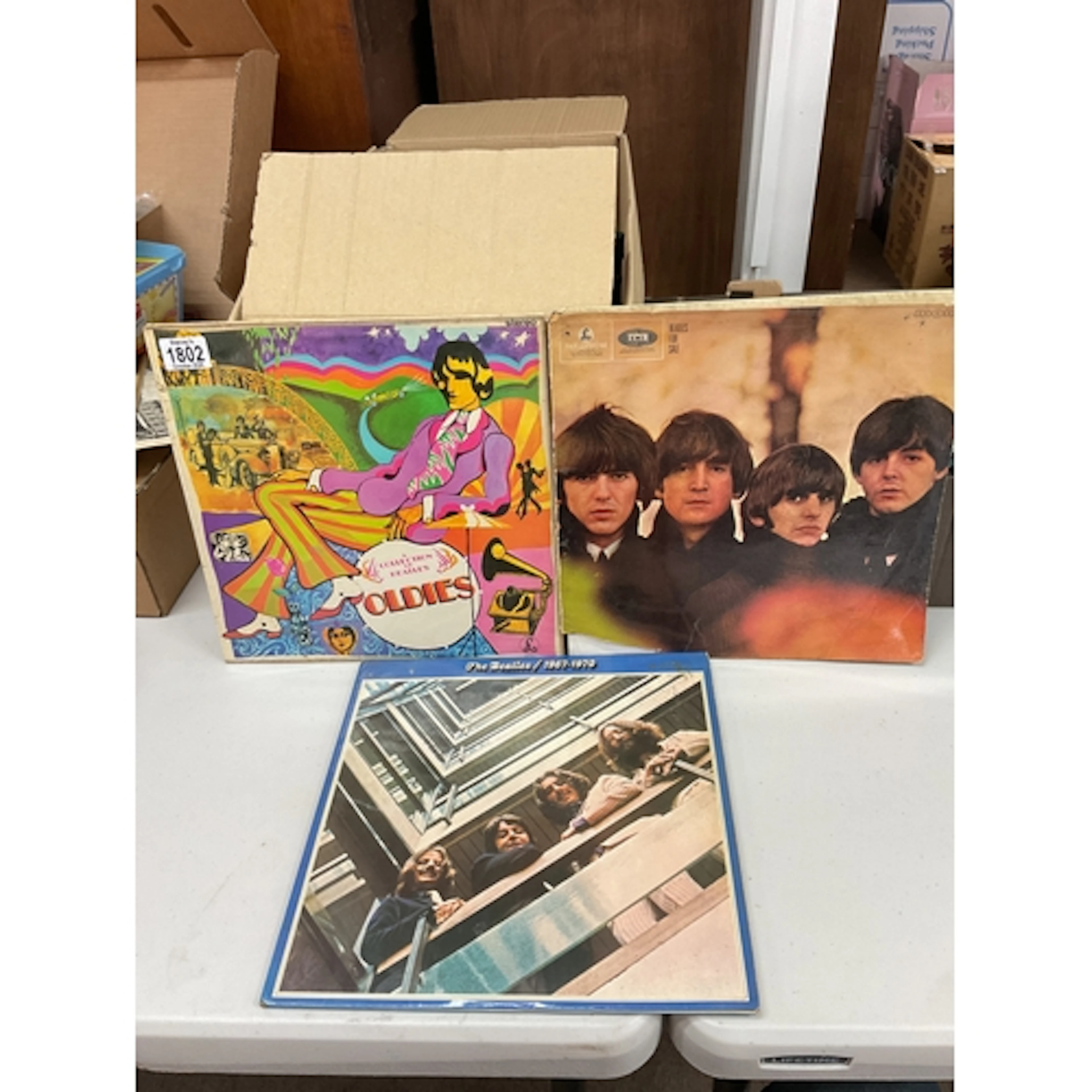 Three Beatles albums, 33rpm.