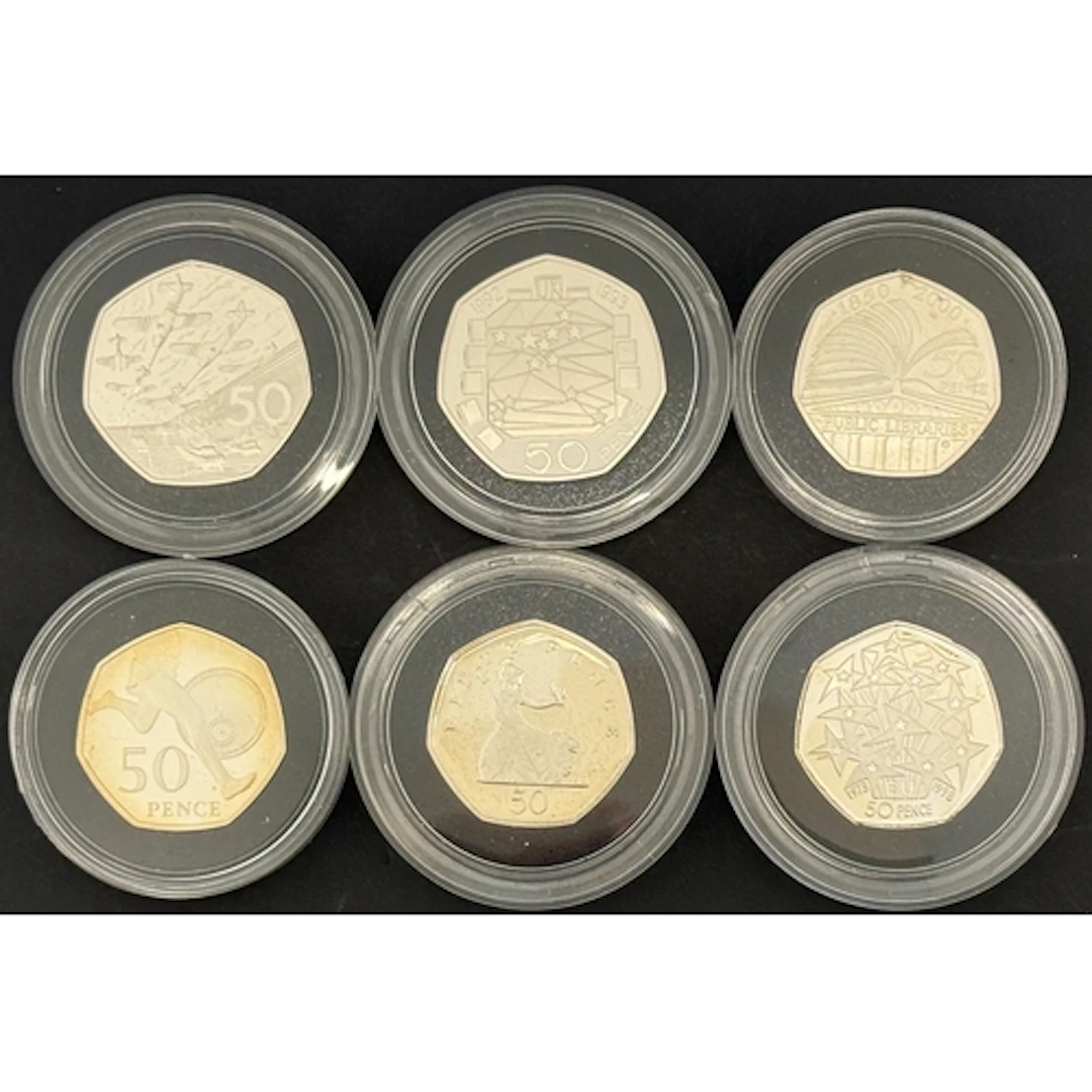 A group of six UK QEII 50p silver proof Piedfort coins, comp...