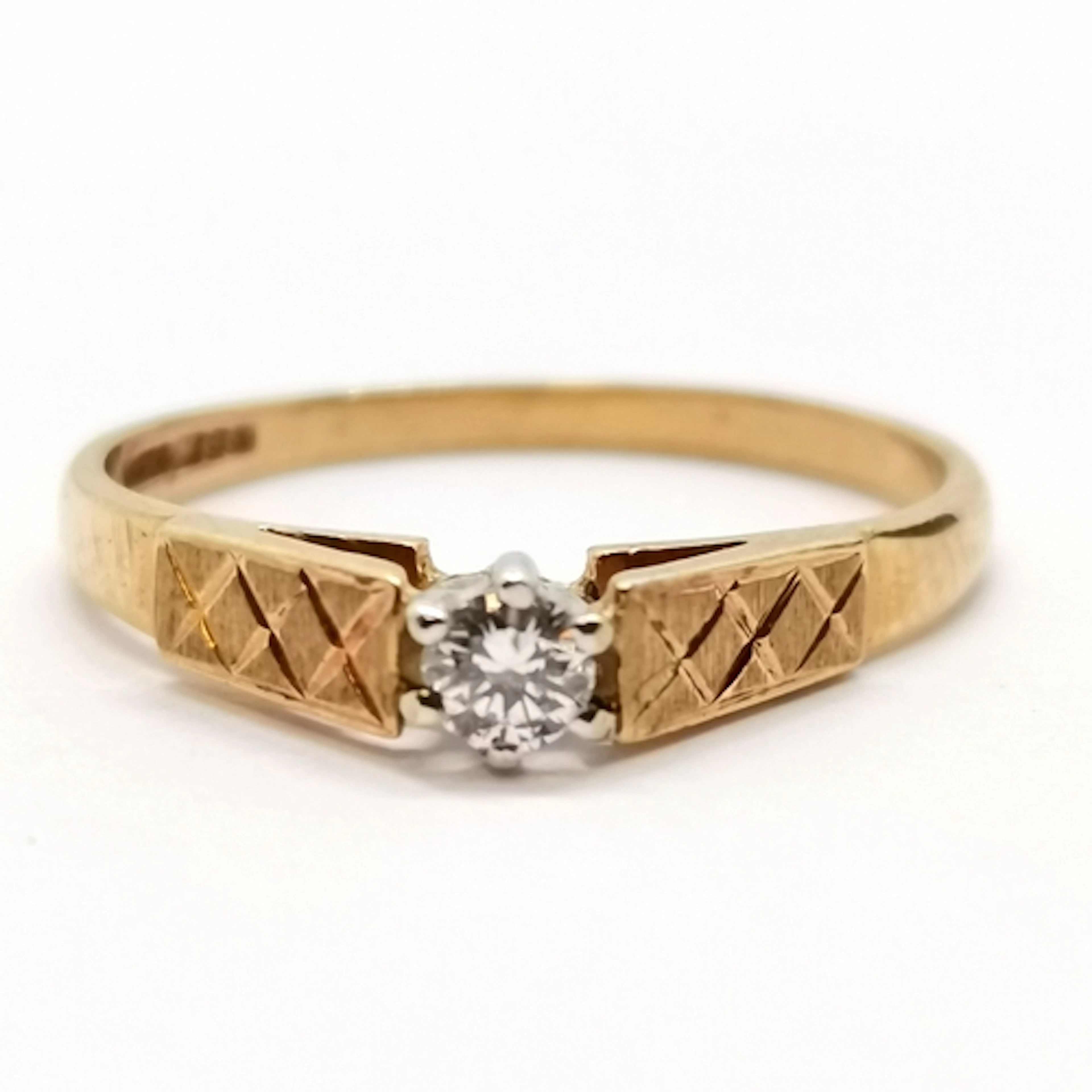 9ct hallmarked gold diamond solitare ring with bright cut sh...