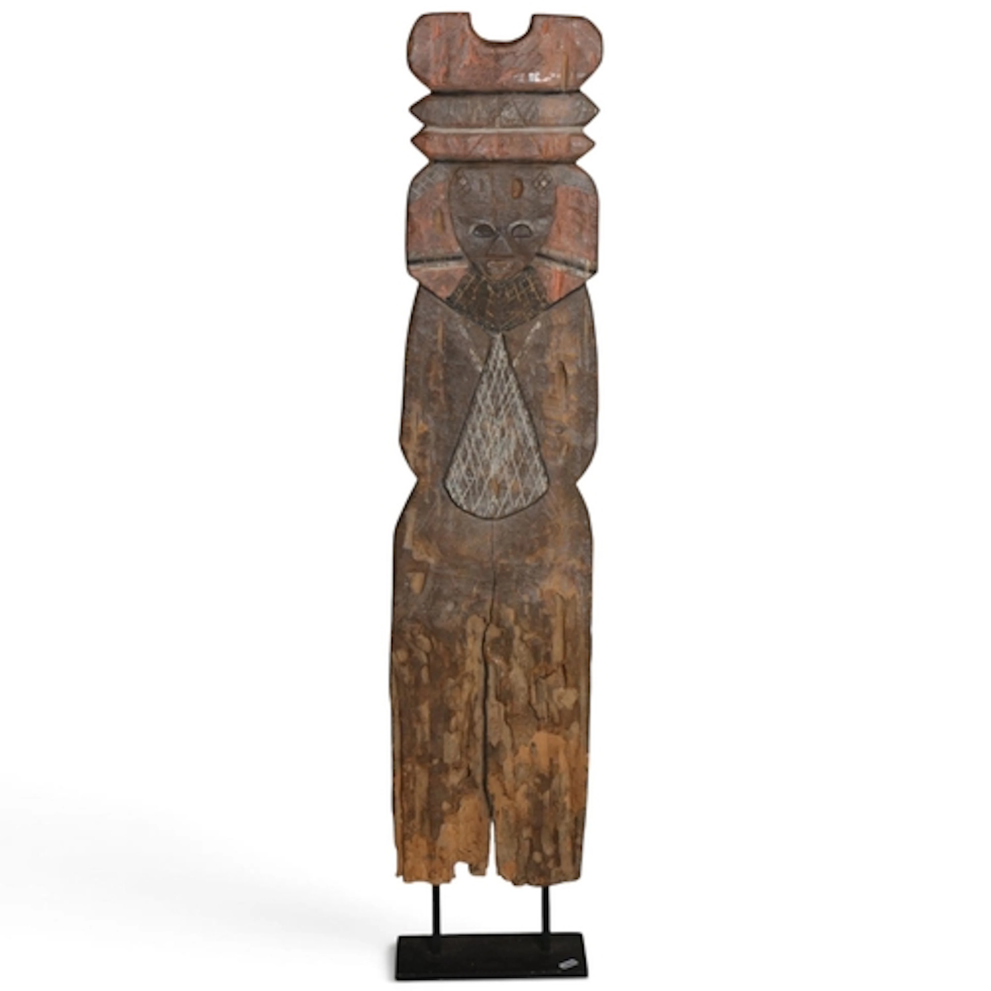 An ancestral post, carved and painted wood on modern metal s...