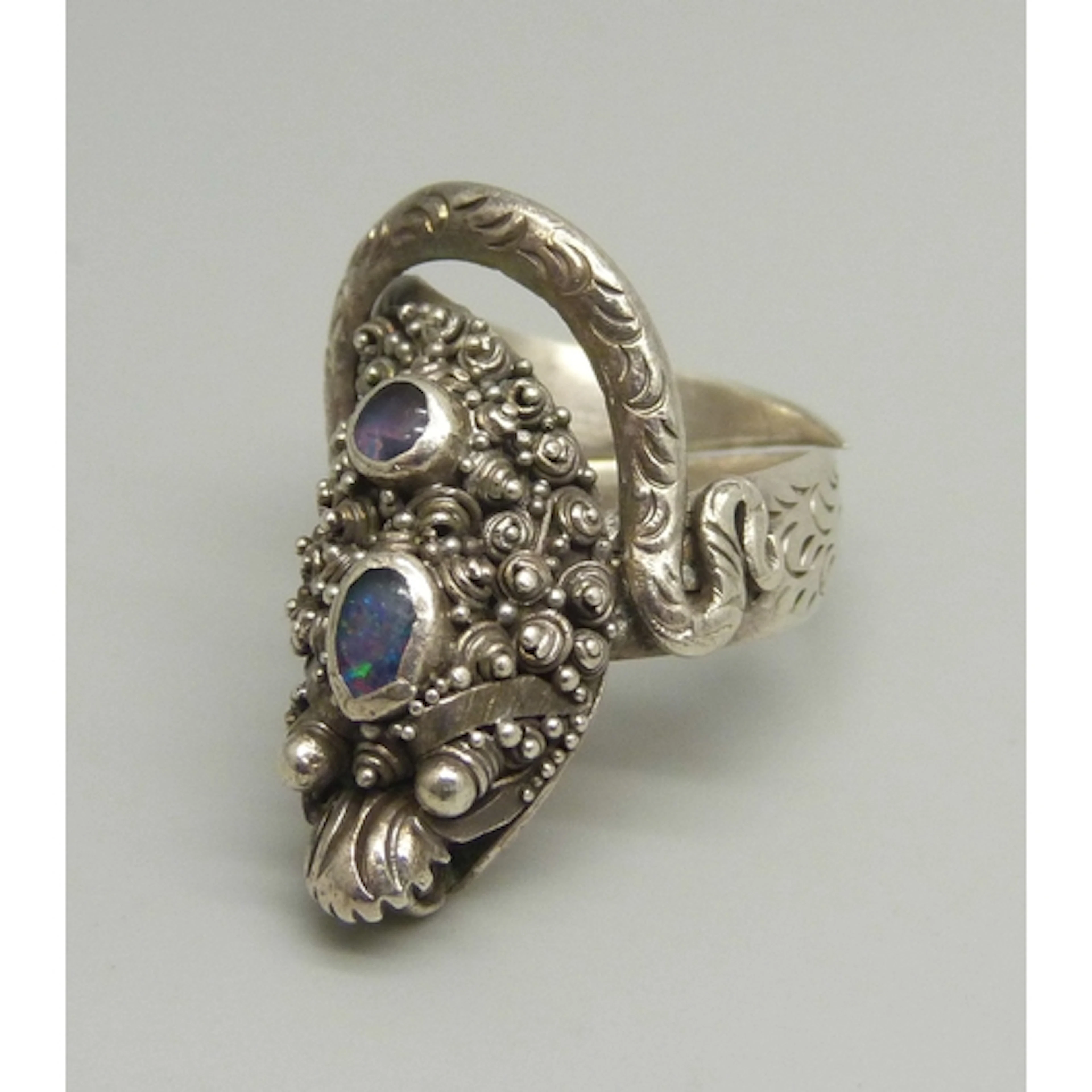 A statement silver ring in the form of a snake, the serpent'...
