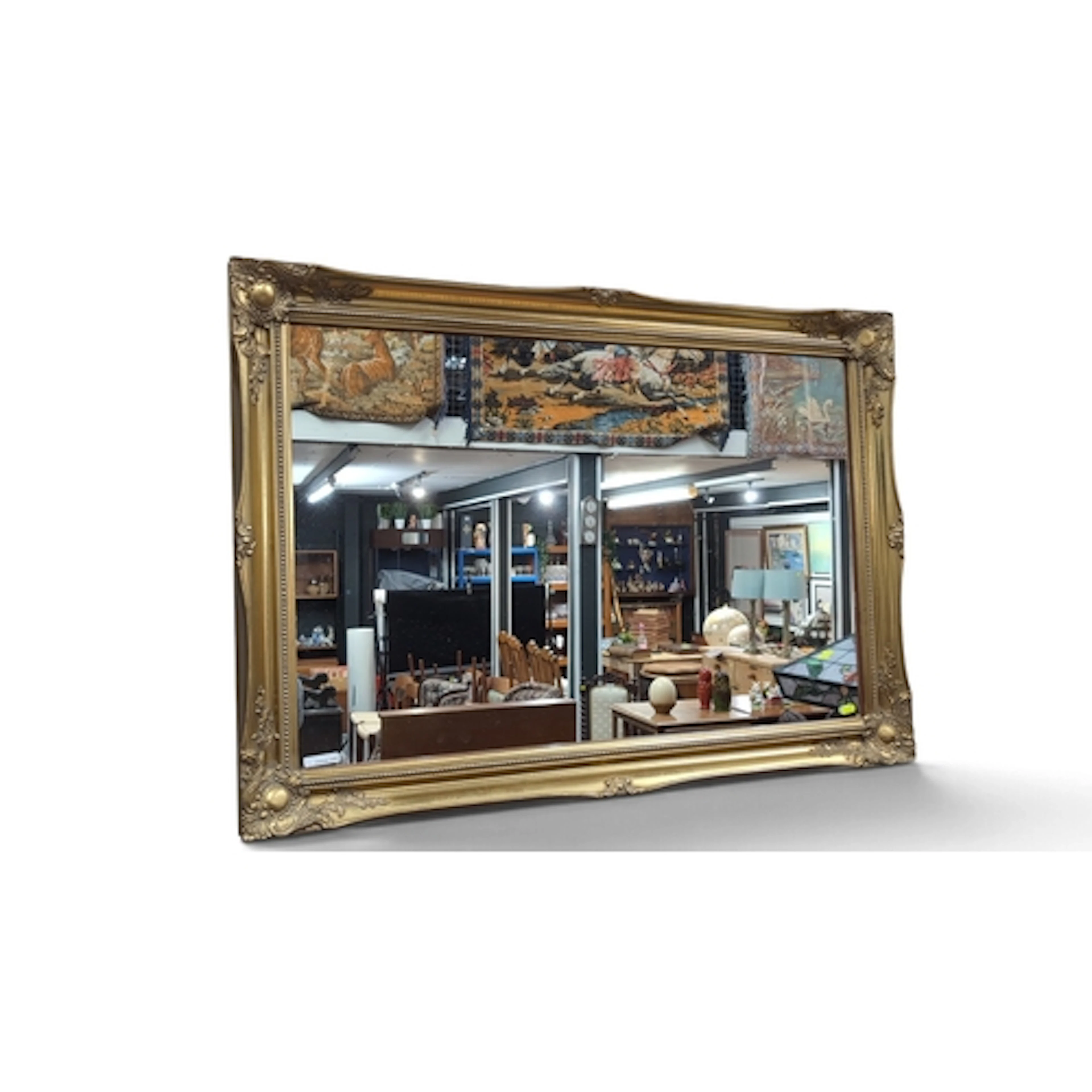 Large rectangular wall mirror in a gilt-finished moulded fra...