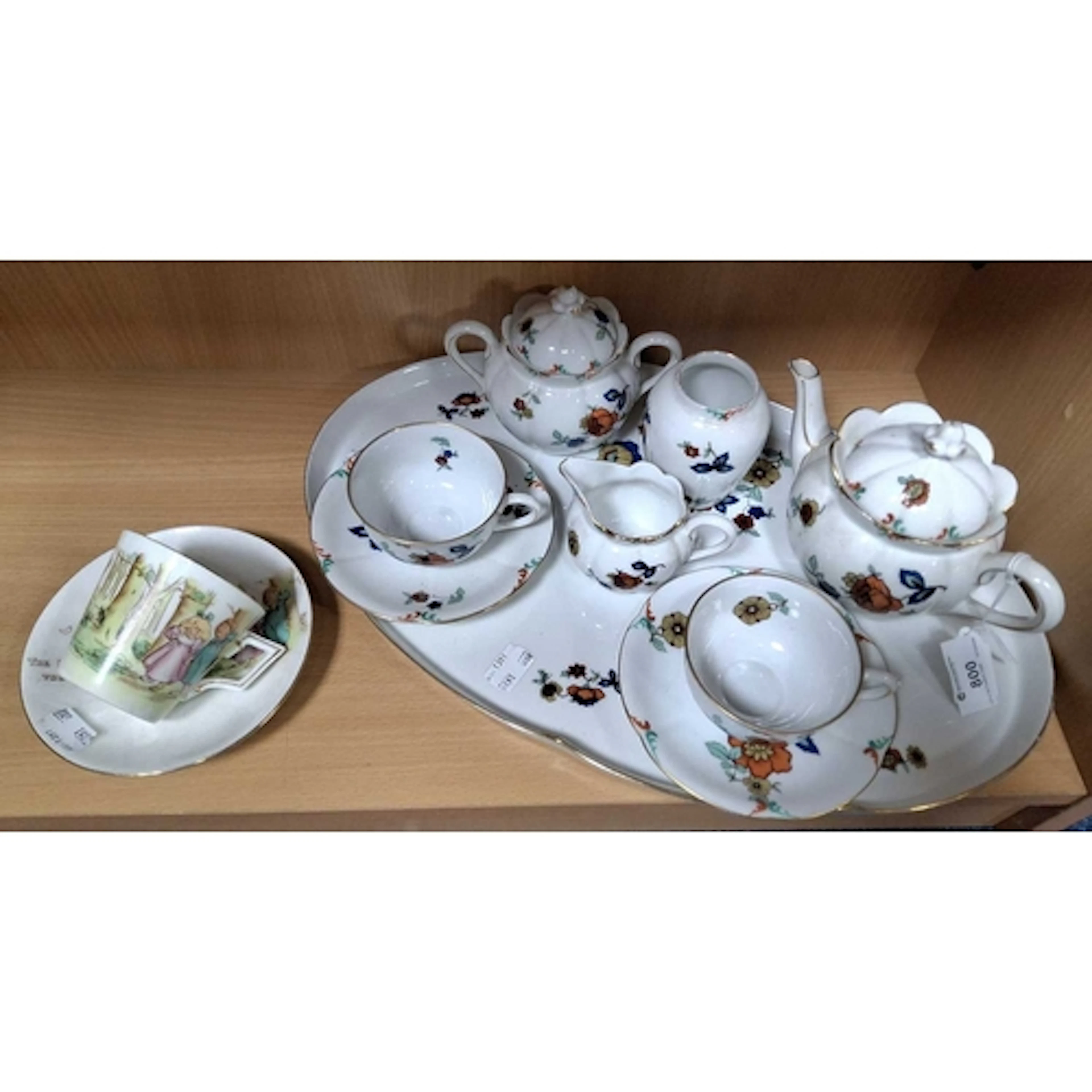 A CONTINENTAL TEA SERVICE AND SHELLEY NURSERY WARE, comprisi...