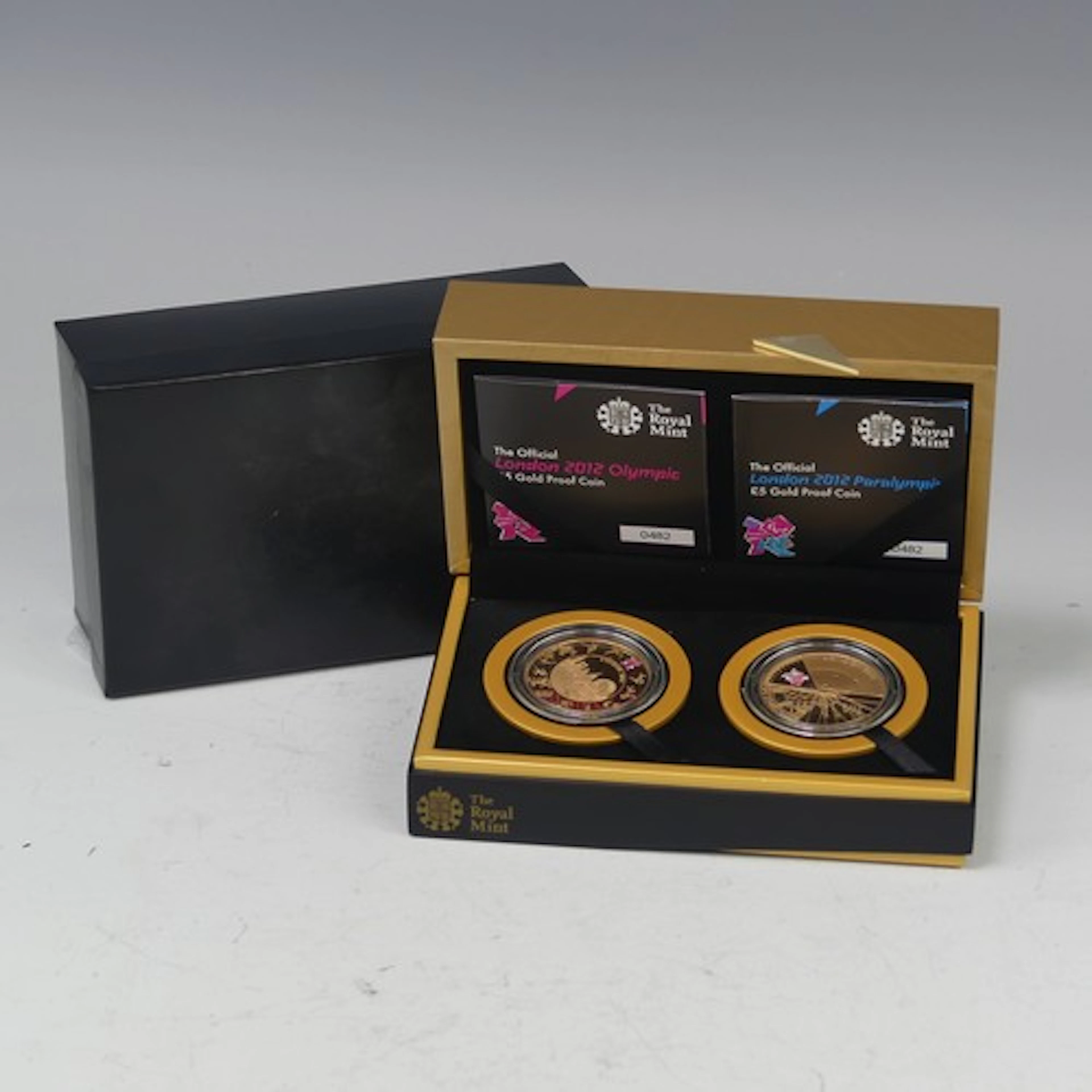 A Royal Mint 'The Official London 2012 Olympic £5 gold proof...