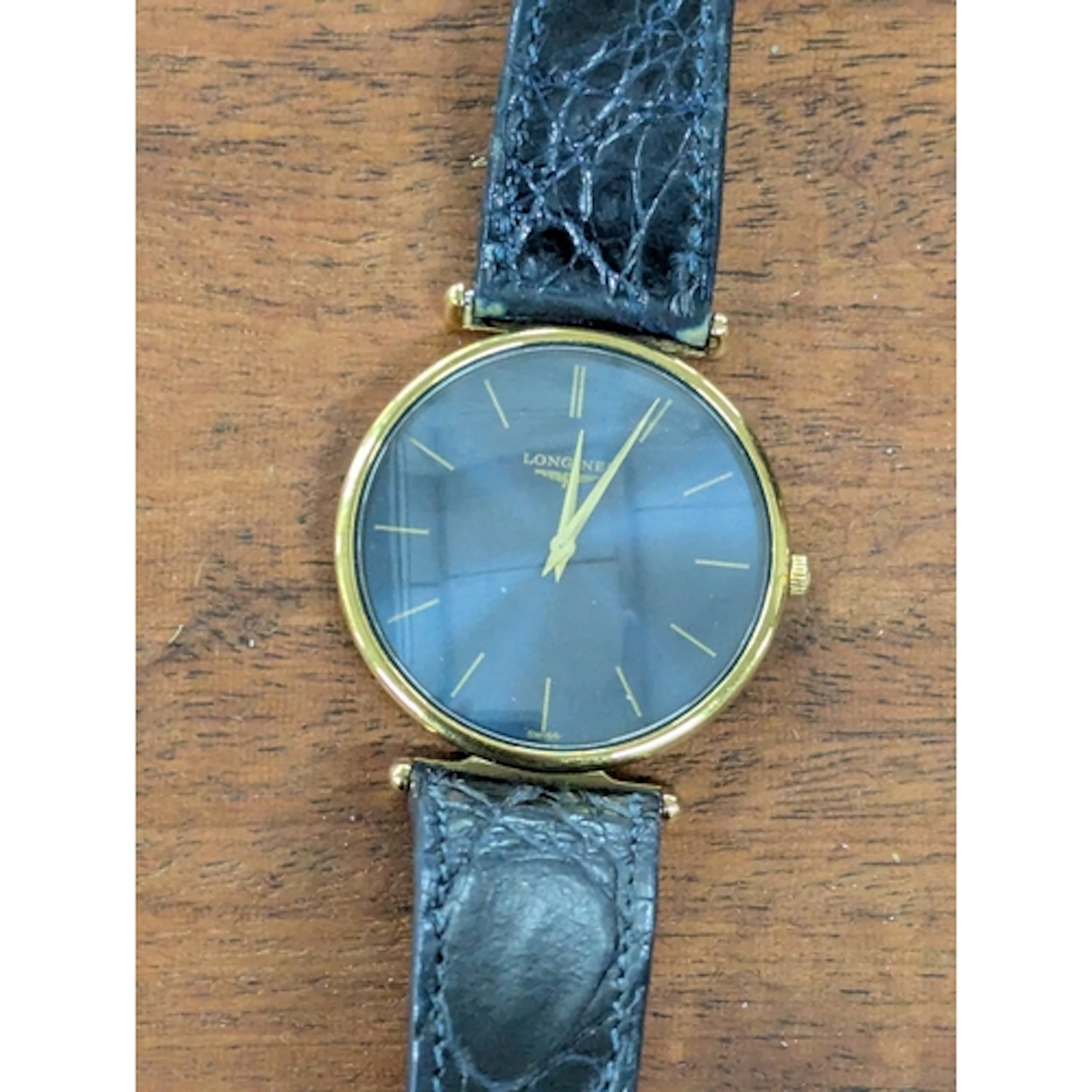 A Longines gents gold plated wristwatch, on a leather strap ...