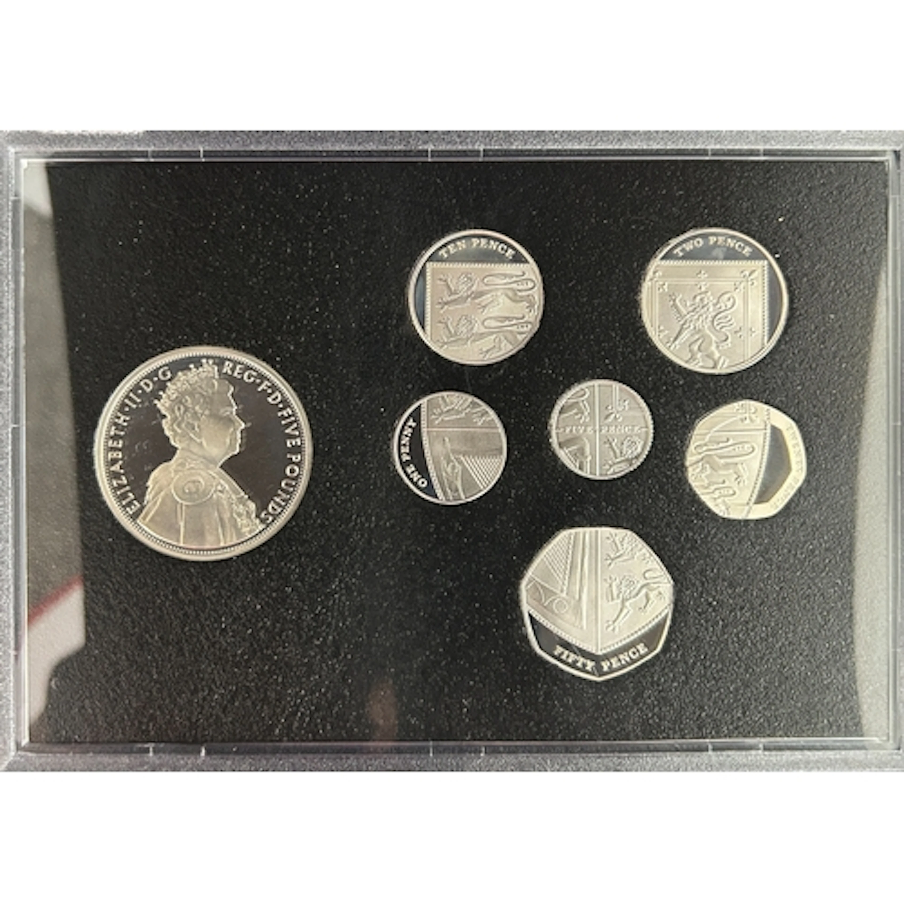 A collection of twenty-one UK QEII silver proof coins and me...