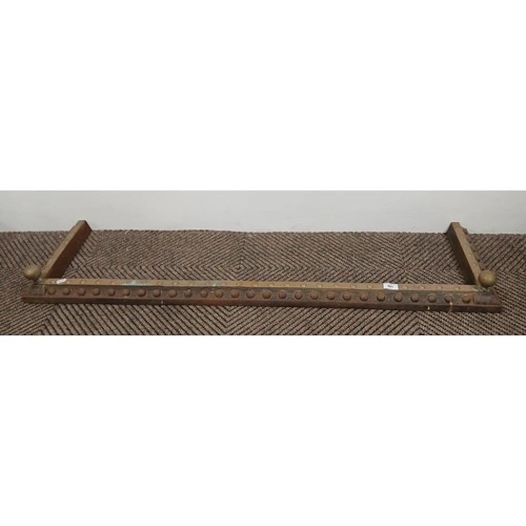 Oak brass mounted fender.
