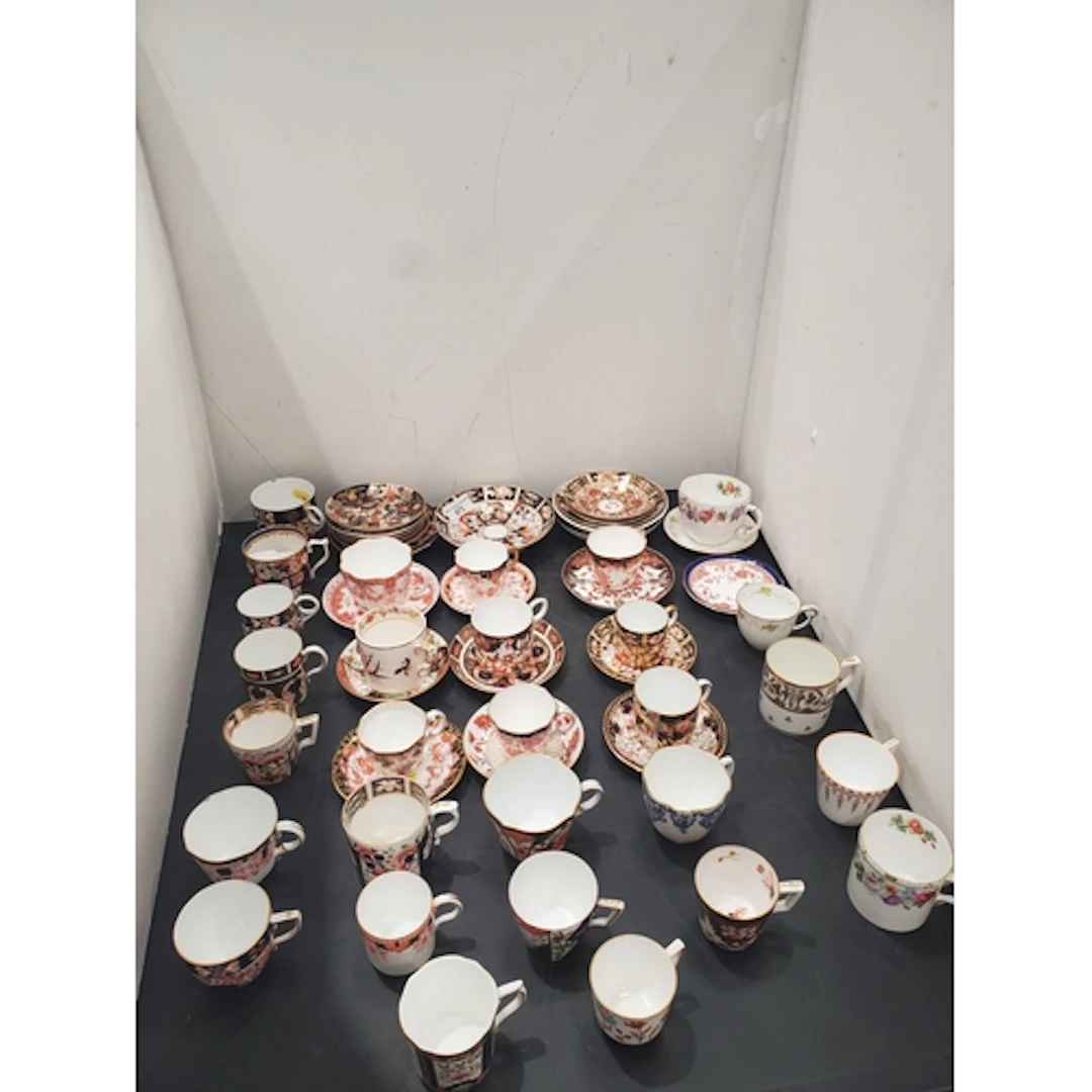 A collection of Royal Crown Derby and other Cups and Saucers...