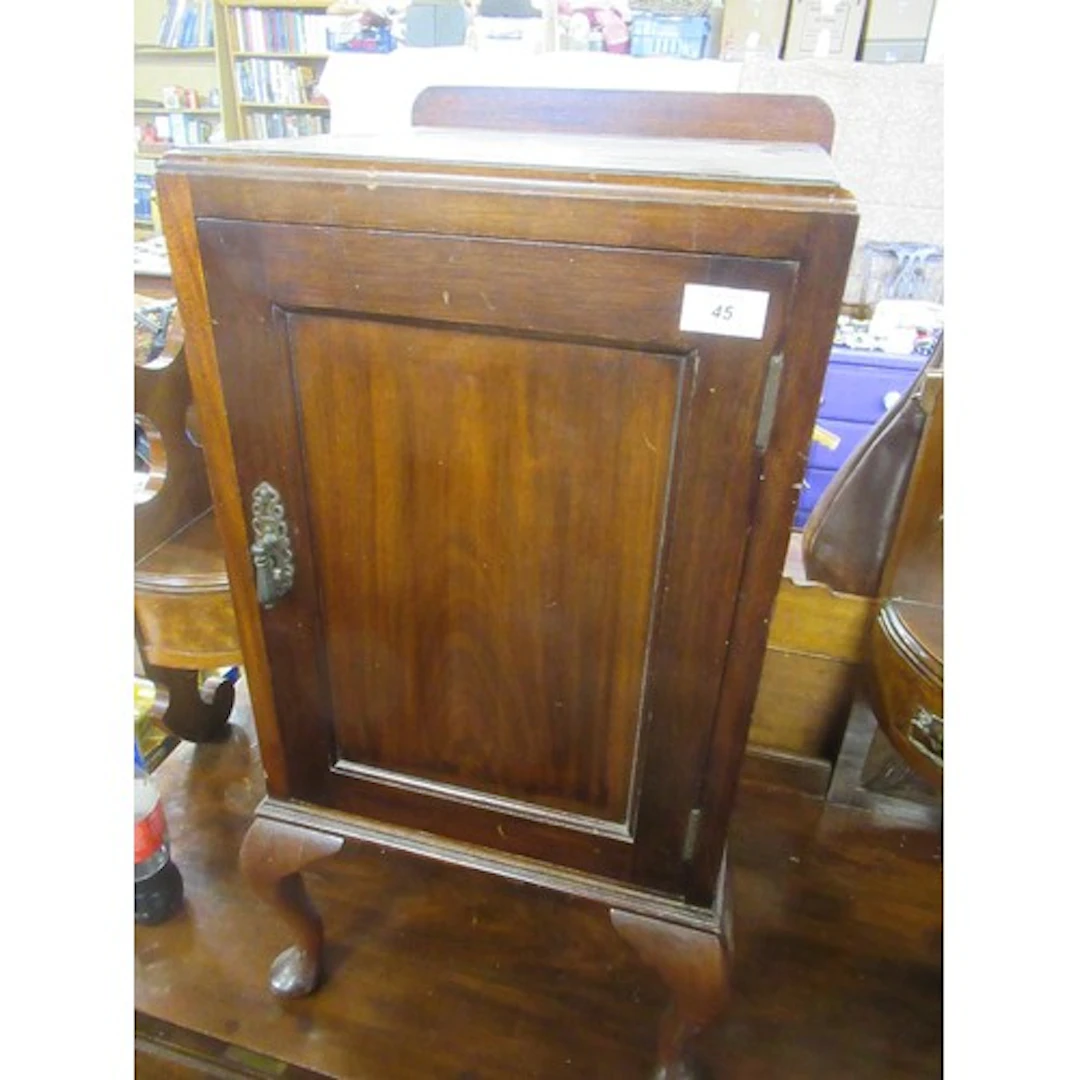 A mahogany pot cupboard