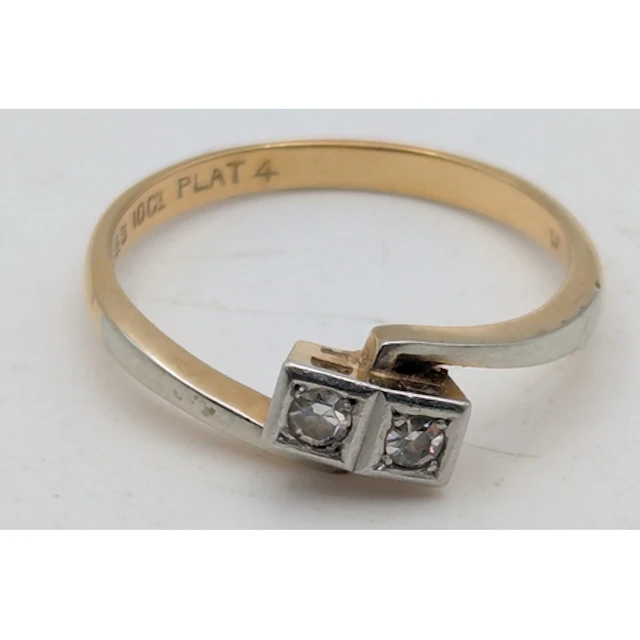 An Art Deco diamond 18ct yellow gold and platinum crossover ...