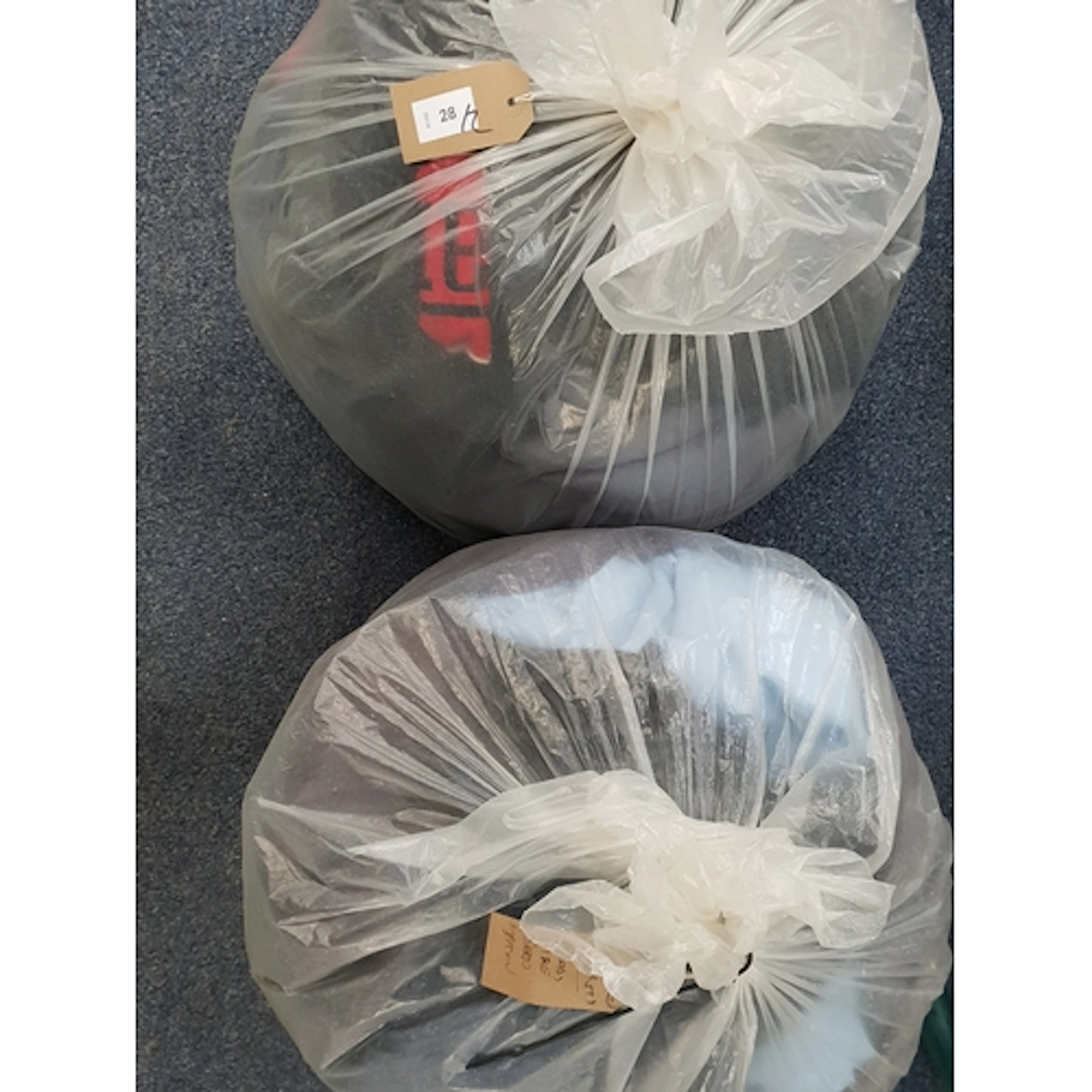 TWO BAGS OF GENTS CLOTHING ITEMS including: a kilt, Ferrari,...