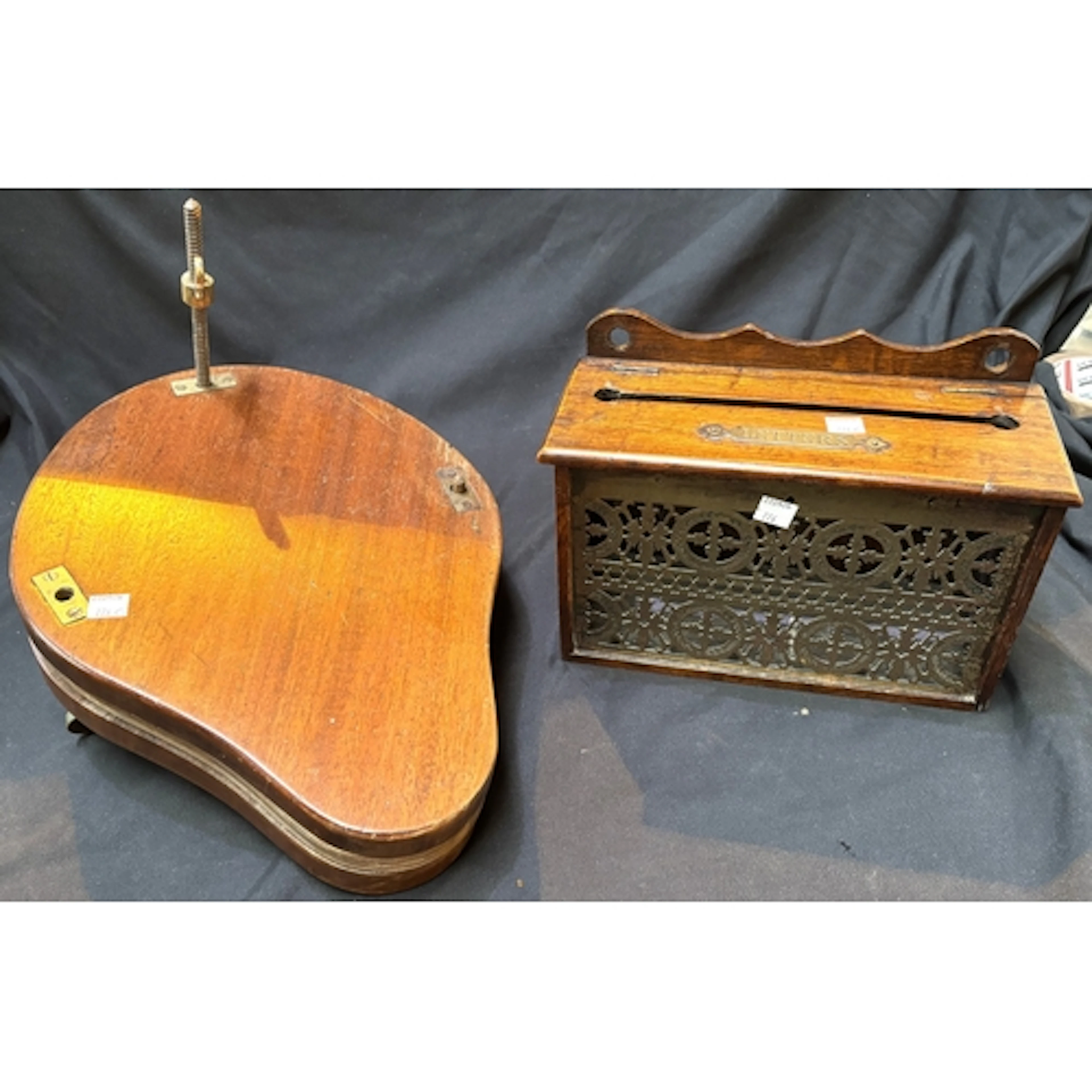 A rectangular oak letter box with pierced brass front panel,...