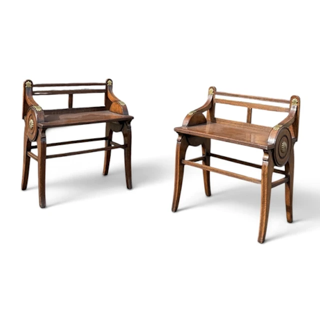 A PAIR OF SHOOLBRED OAK STOOLS