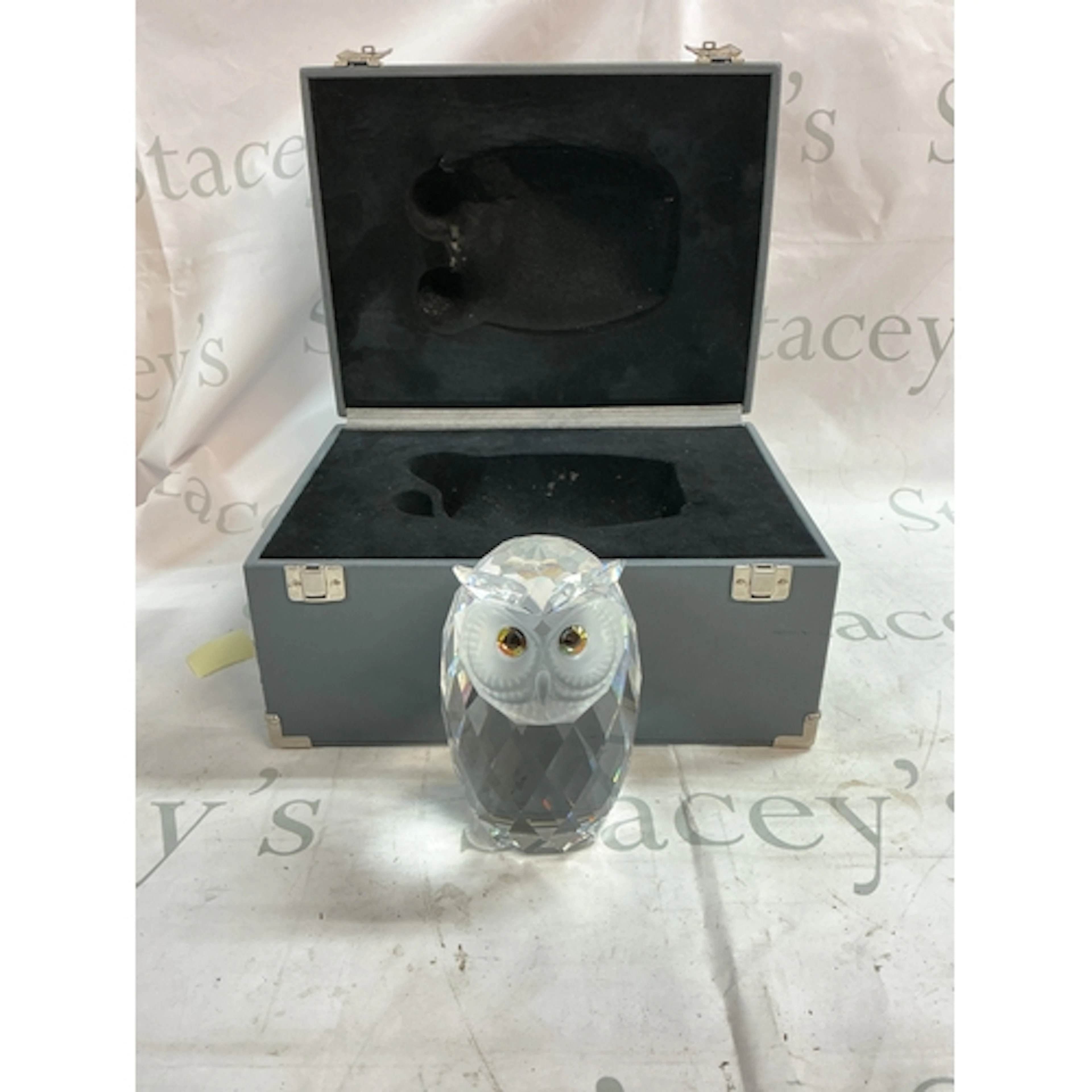A cased Swarovski owl