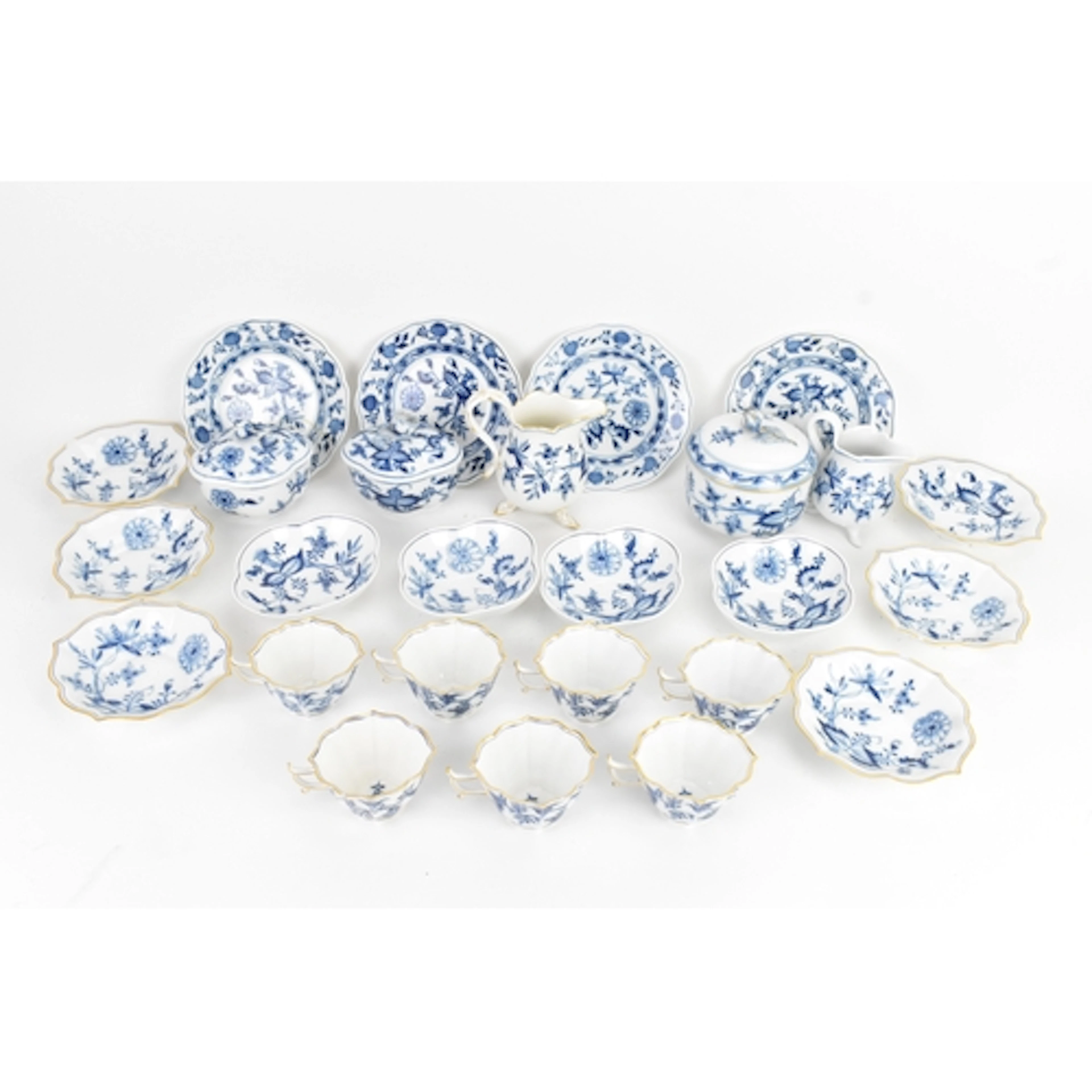 A Meissen ‘Blue Onion’ porcelain part tea service, decorated...