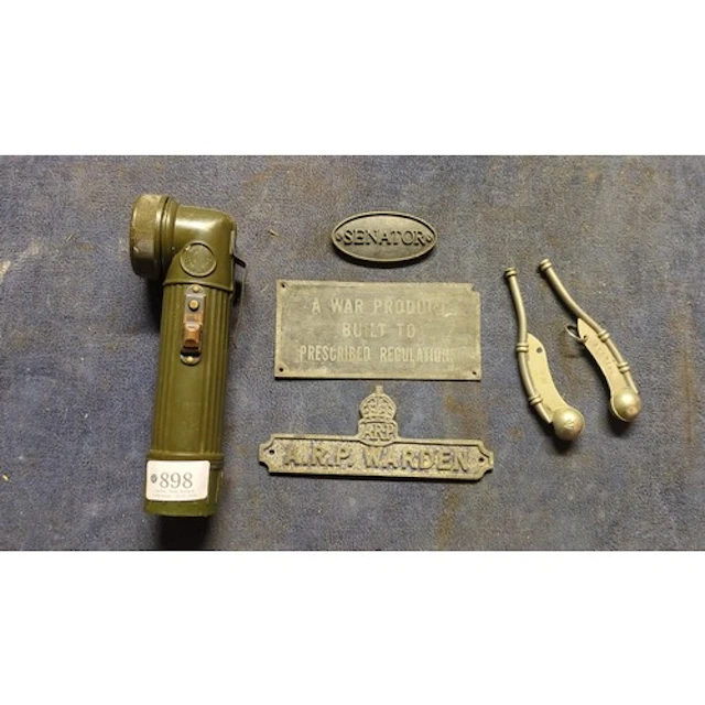 A group of objects including a G.E.C. right-angle torch, an ...