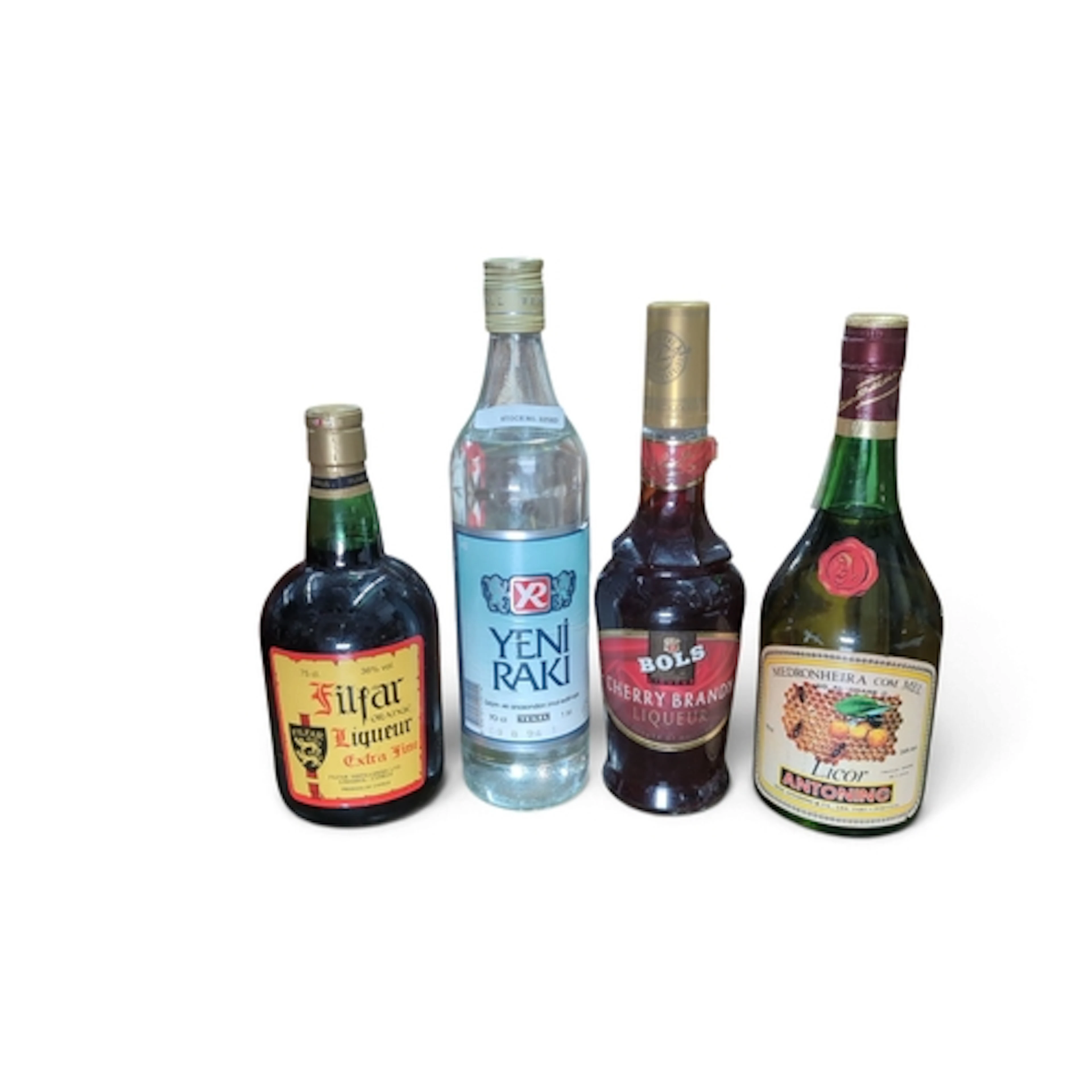 A group of bottled spirits and liqueurs, comprising Filfar o...