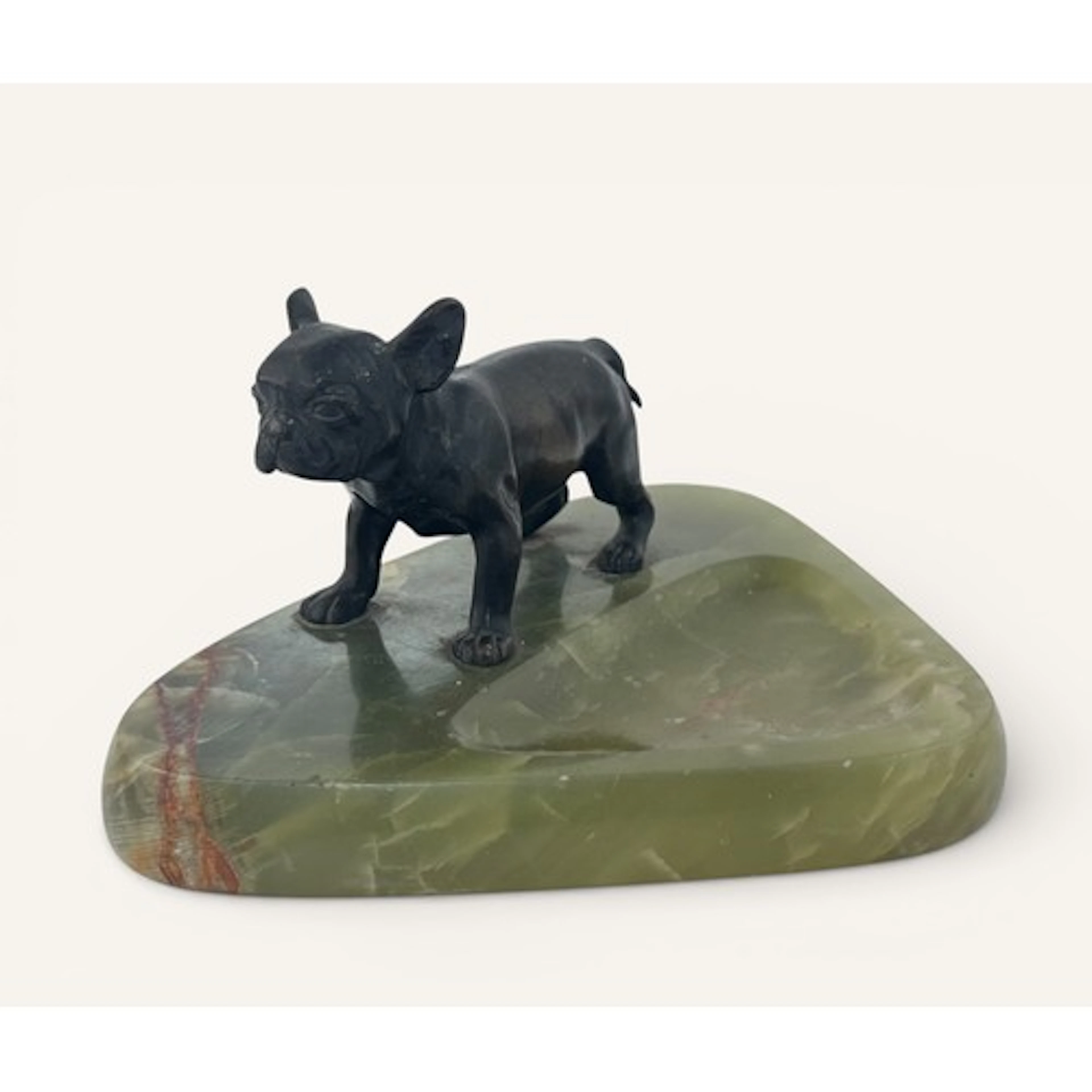 A triangular onxy ashtray with spelter French Bulldog sculpt...