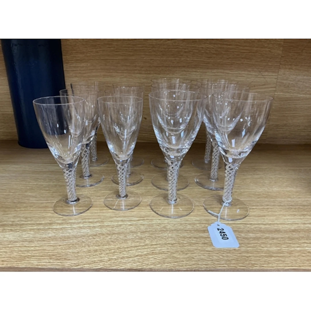 A set of twelve Ariel style air twist stem wine glasses in t...